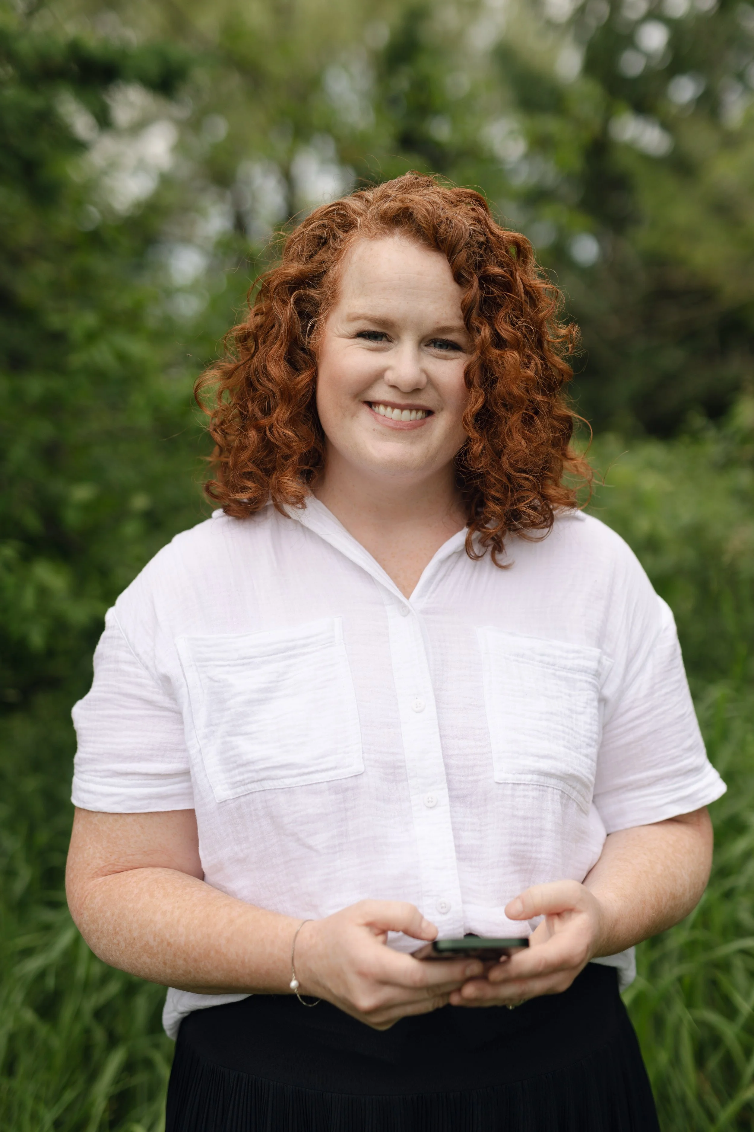 Carley Donaldson holding phone