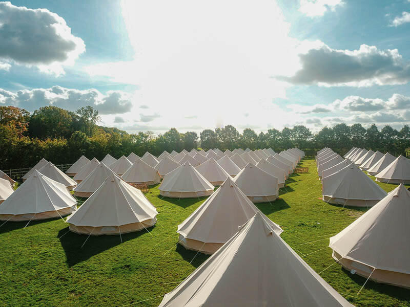  
Our canvas tents are a festival game changer. Not only stylish and easy-to-spot in a sea of nylon tents, they’re roomy, airy and versatile (think common space or place to sleep).