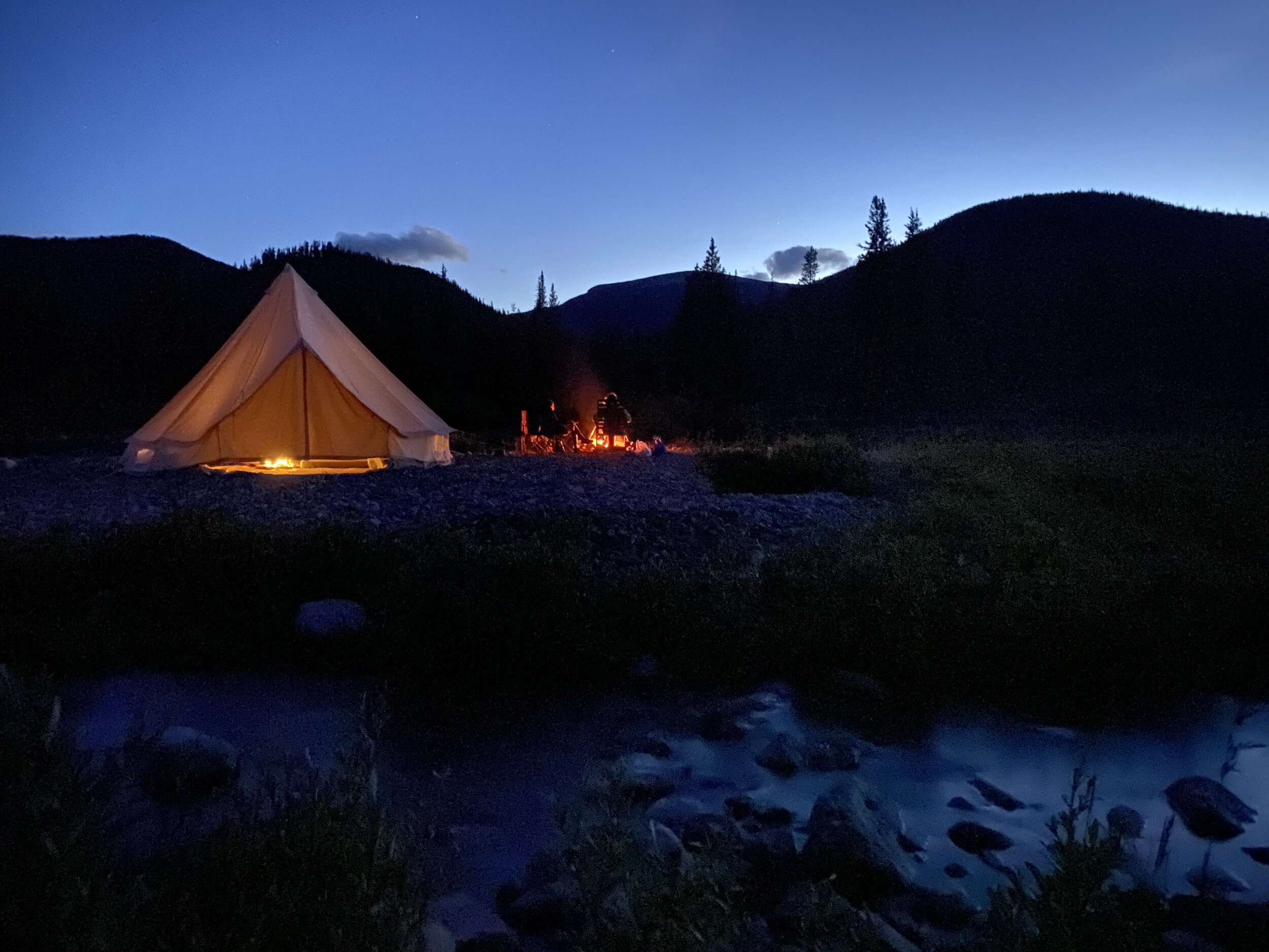 Night camping bell tent canada.jpeg