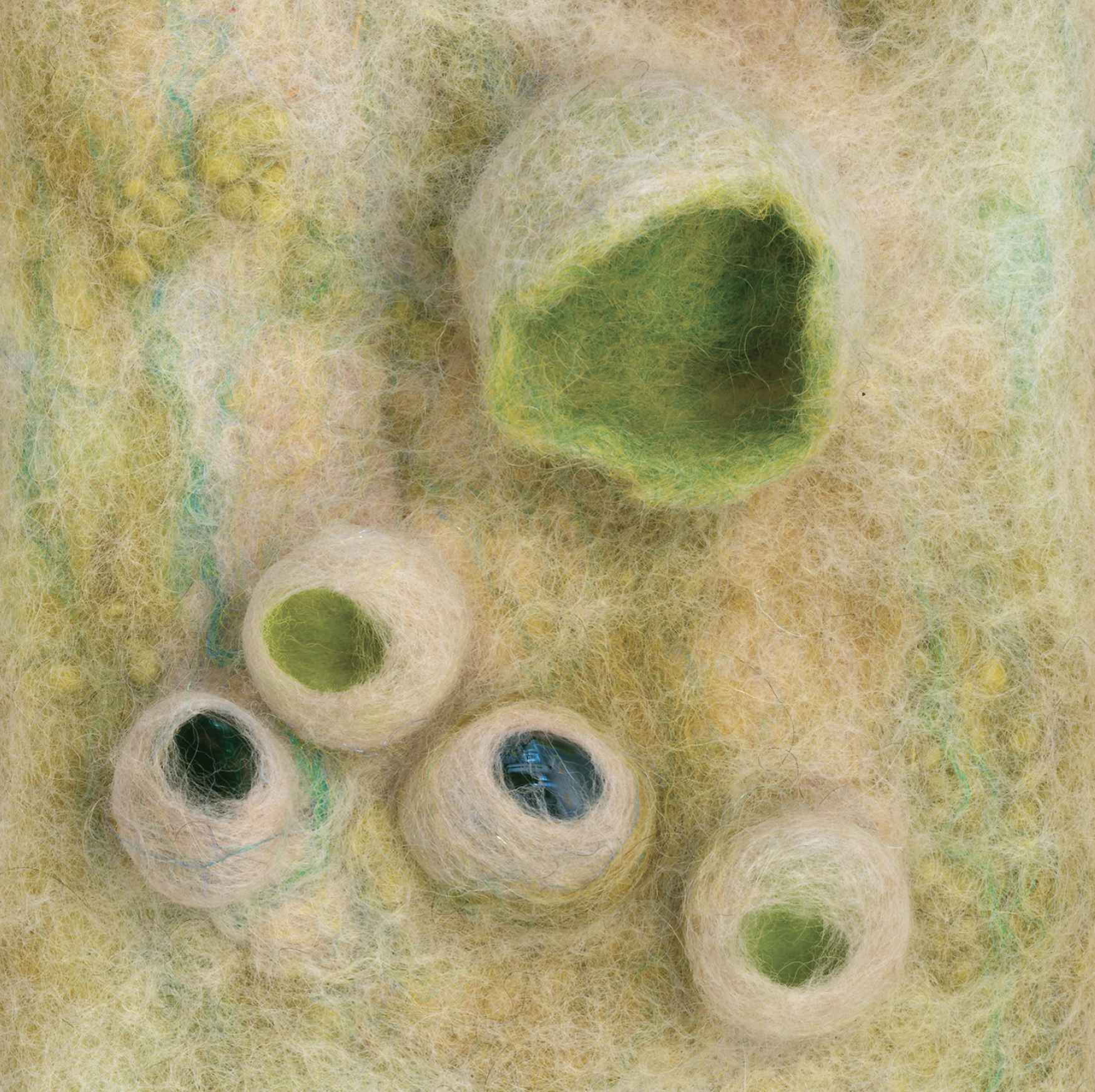Wunjo, 2014 | felted wool, glass, beach stones & wood | 6 x 10 x 3 inches