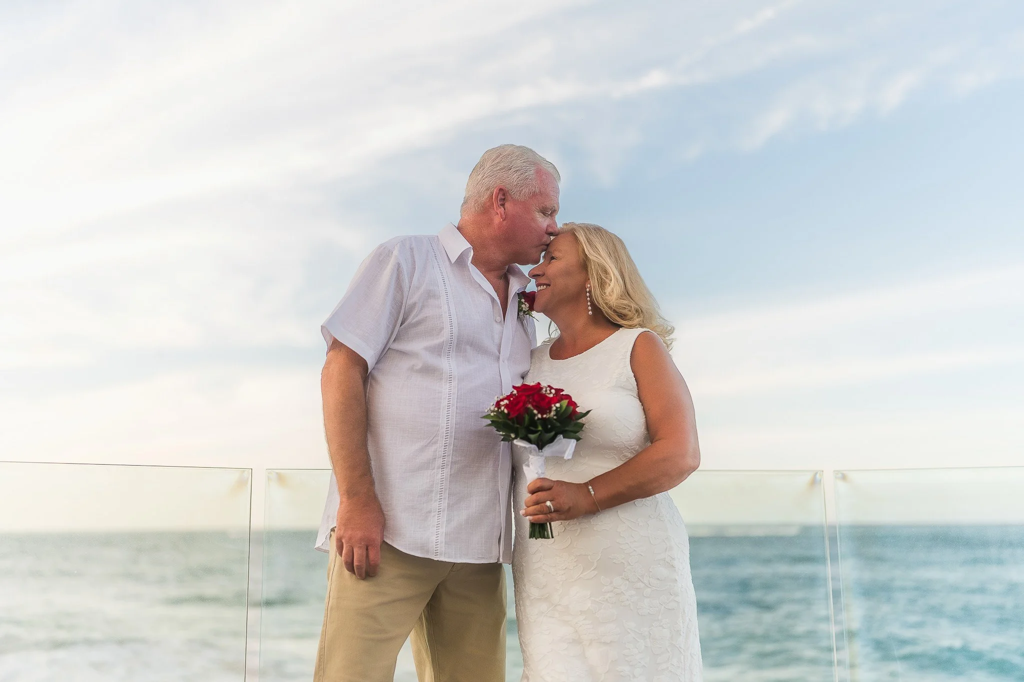 Bride and groom during their elopement ceremony at the Condado Vanderbilt Hotel taken by a Puerto Rico destination wedding photographer