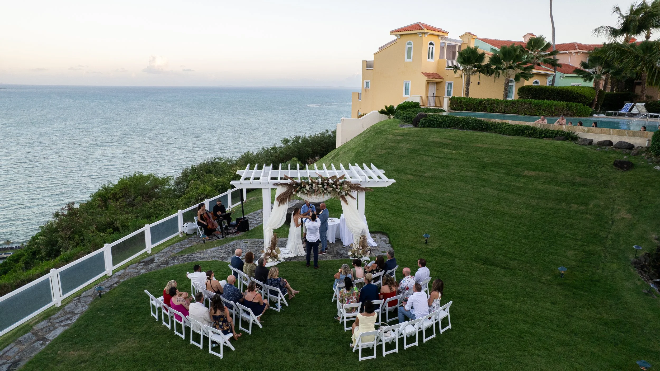 Drone shot of a luxury wedding at El Conquistador Resort shot by an elopement photographer in Puerto Rico