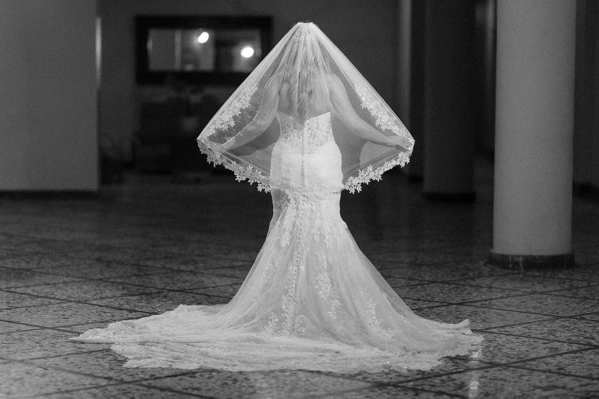 Bride posing like Kim Kardashian taken by a Puerto Rico elopement wedding photographer