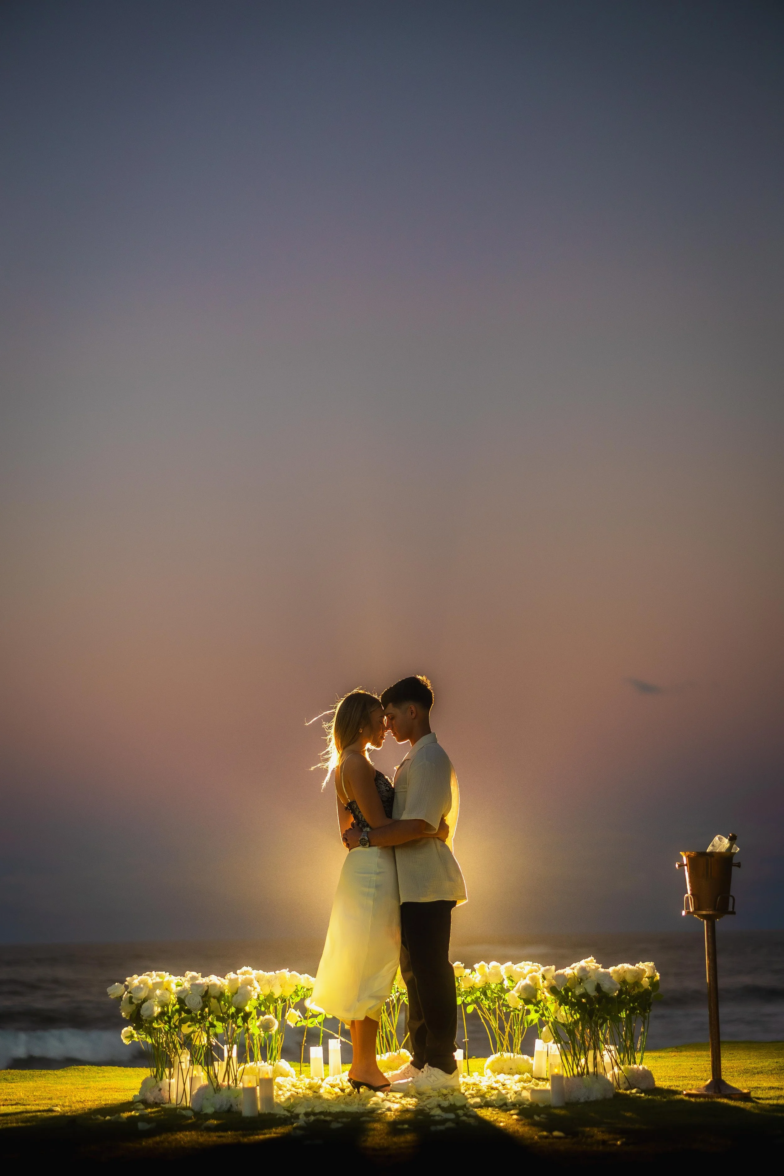 Golden hour engagement session in Escambrón Puerto Rico during a luxury surprise marriage proposal