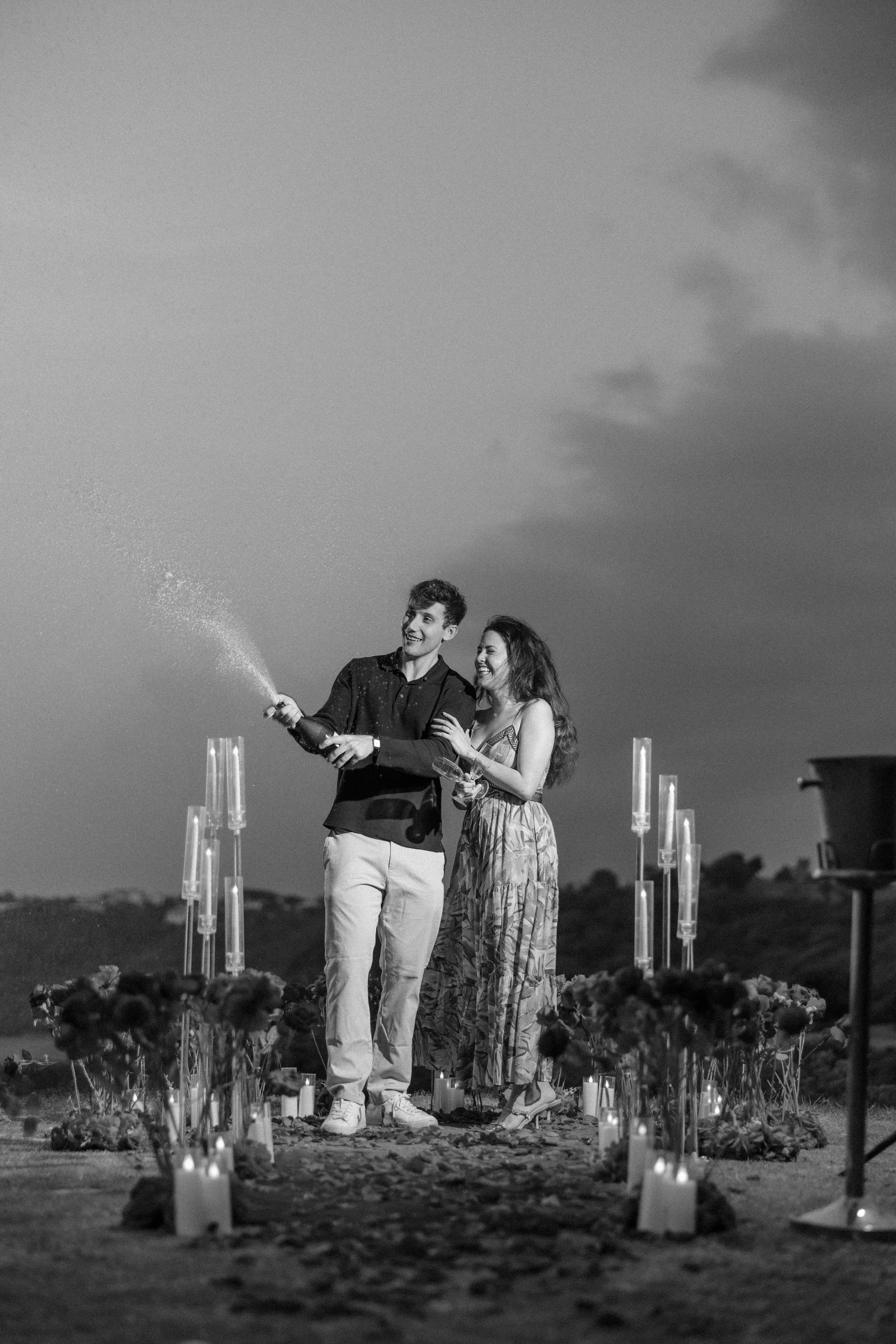 Black and white editorial portrait of a couple during an engagement session in Puerto Rico at Royal Isabela taken by a destination wedding photographer