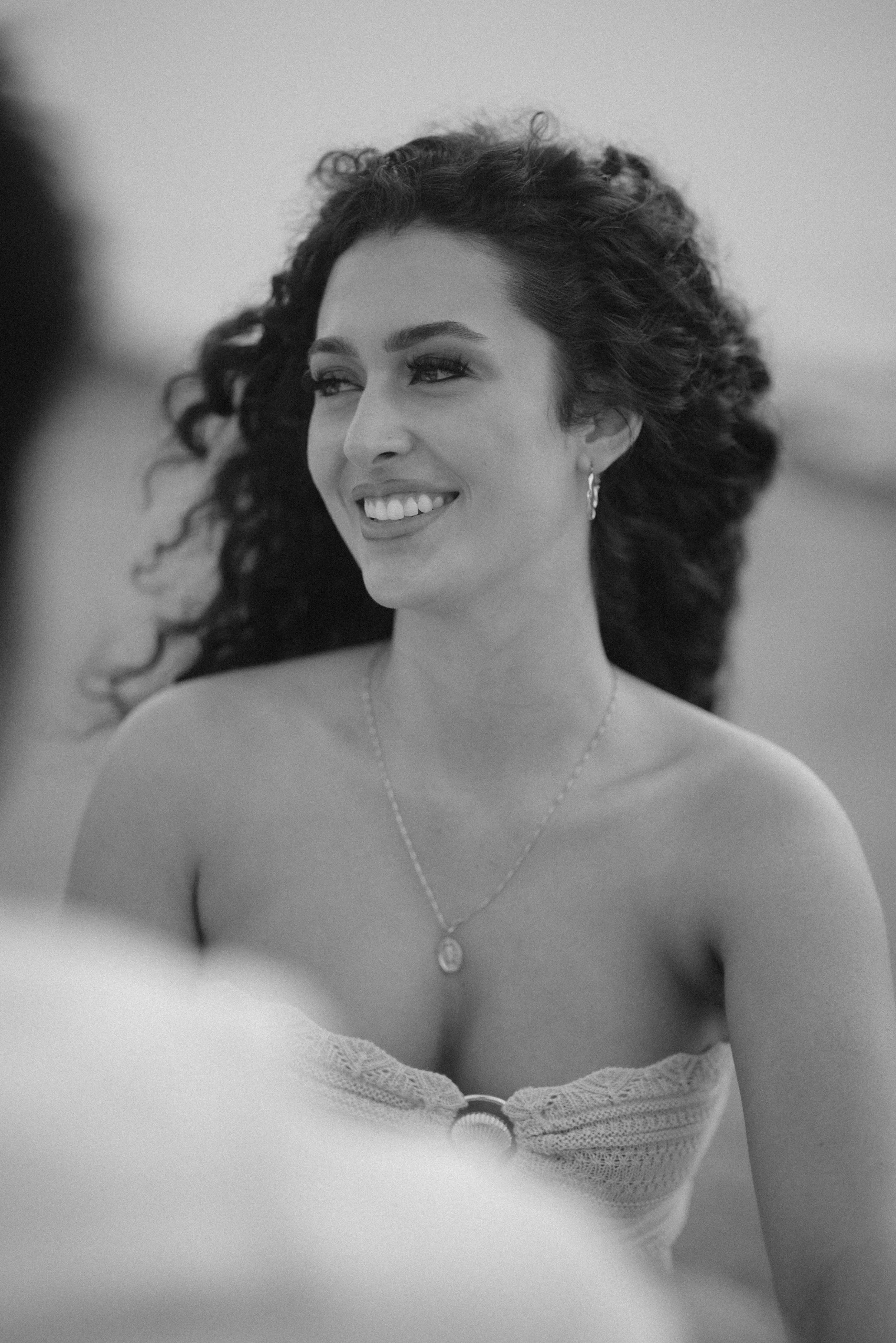 Editorial black and white portrait of a female model during an engagement session after a marriage proposal in Puerto Rico