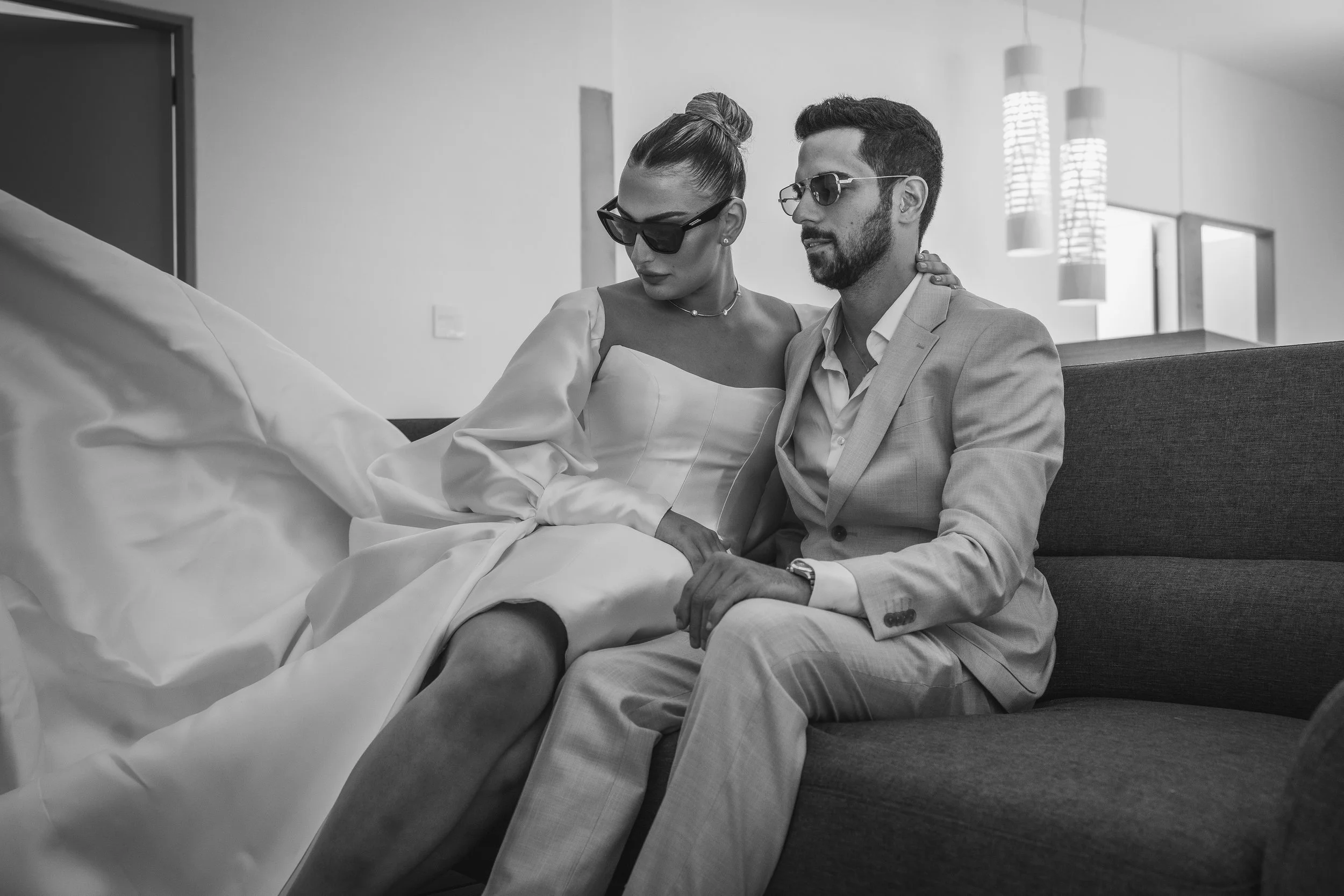 Detailed close-up of luxury wedding dress showcasing intricate lace and craftsmanship