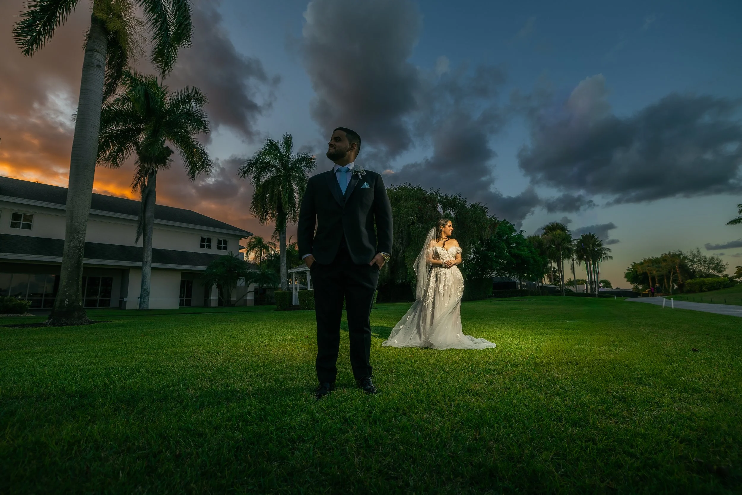 Bride and groom embracing during golden hour in Boynton Beach, Florida at Indian Spring Country Club