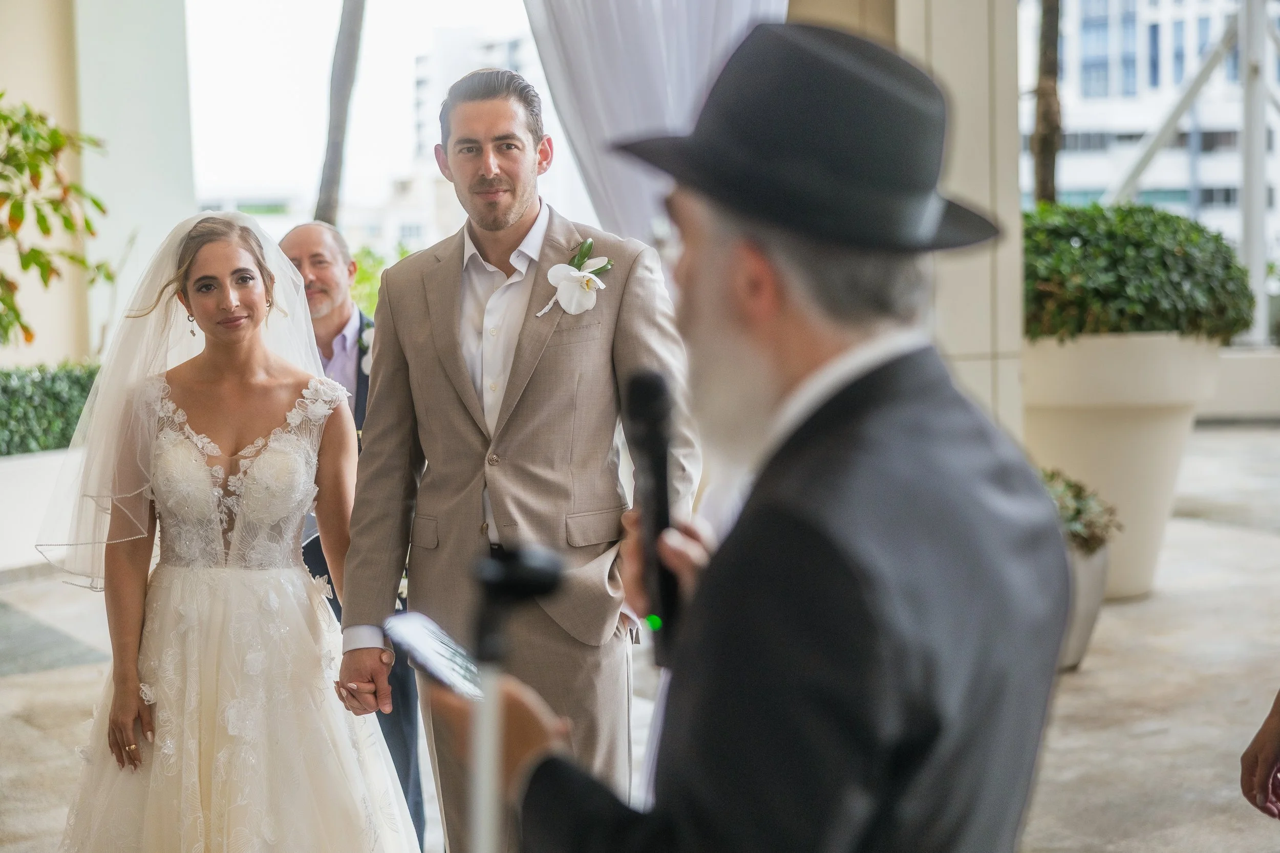 Jewish wedding ceremony shot by a luxury elopement photographer in Puerto Rico at La Concha Resort