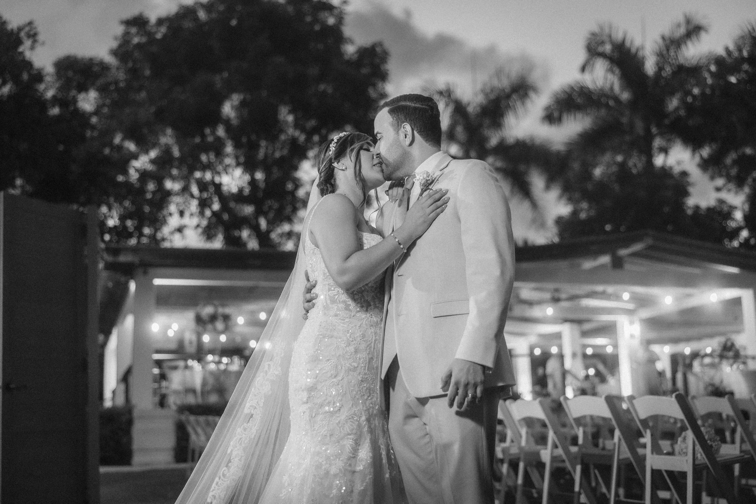 Couple kissing at wedding in Hacienda Santiago in Puerto Rico