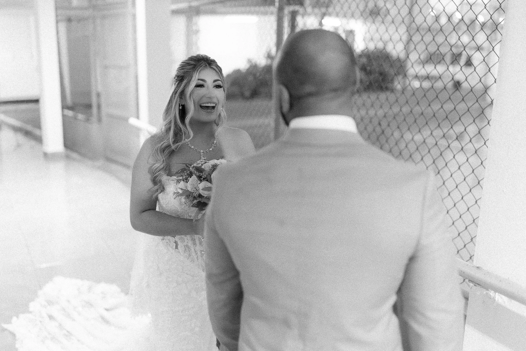Editorial black and white portrait of a bride and groom at Condado del Mar during their vow exchange