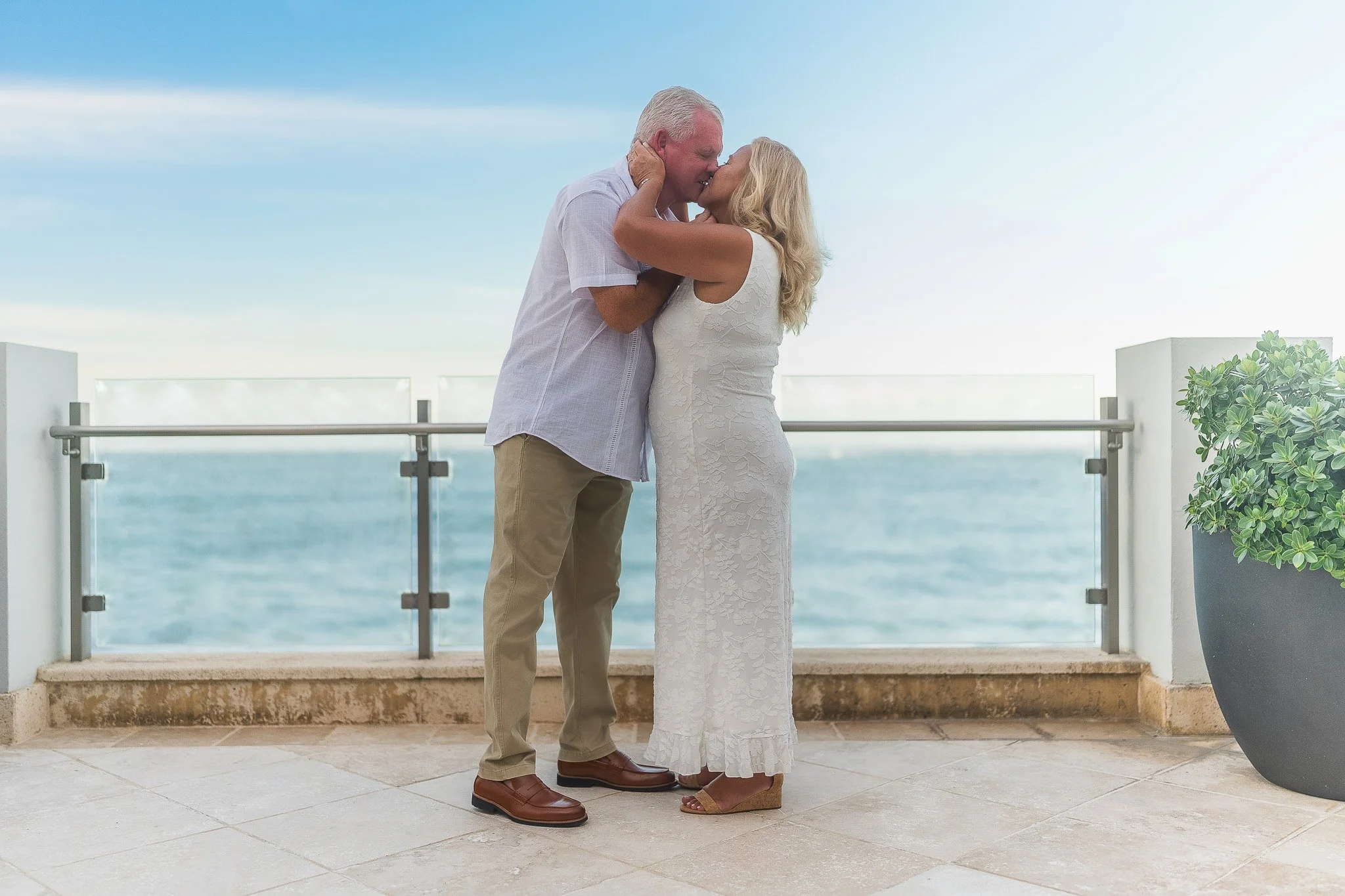 Bride and groom kissing during an elopement wedding at the Condado Vanderbilt Hotel in Puerto Rico