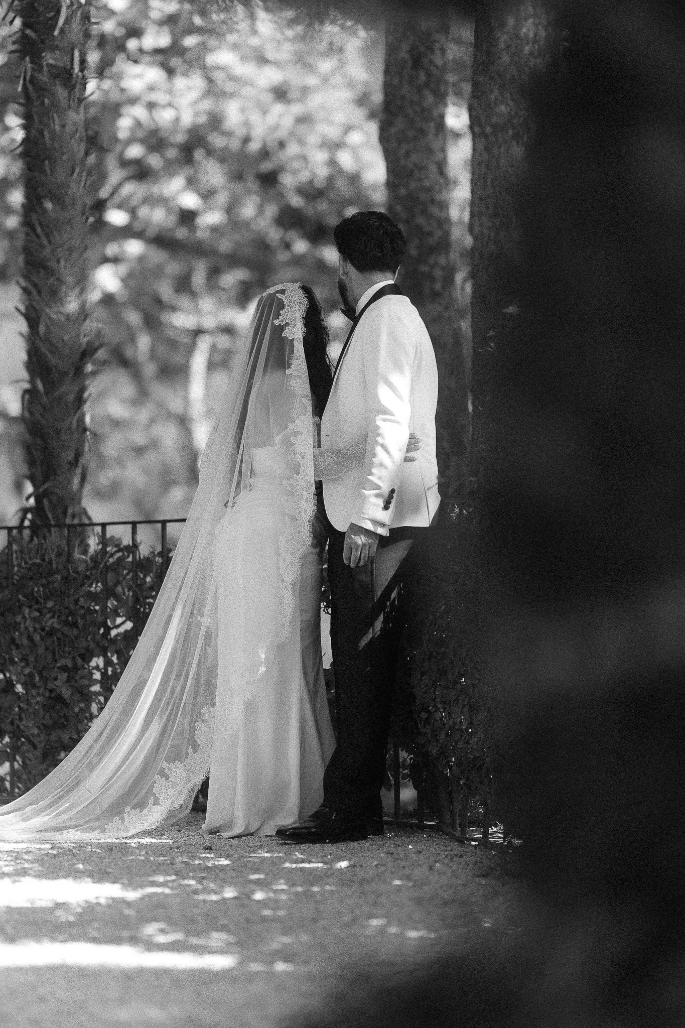Couple posing during editorial elopement at the Villa del Balbianello in Lake Como shot by a wedding photographer in Italy