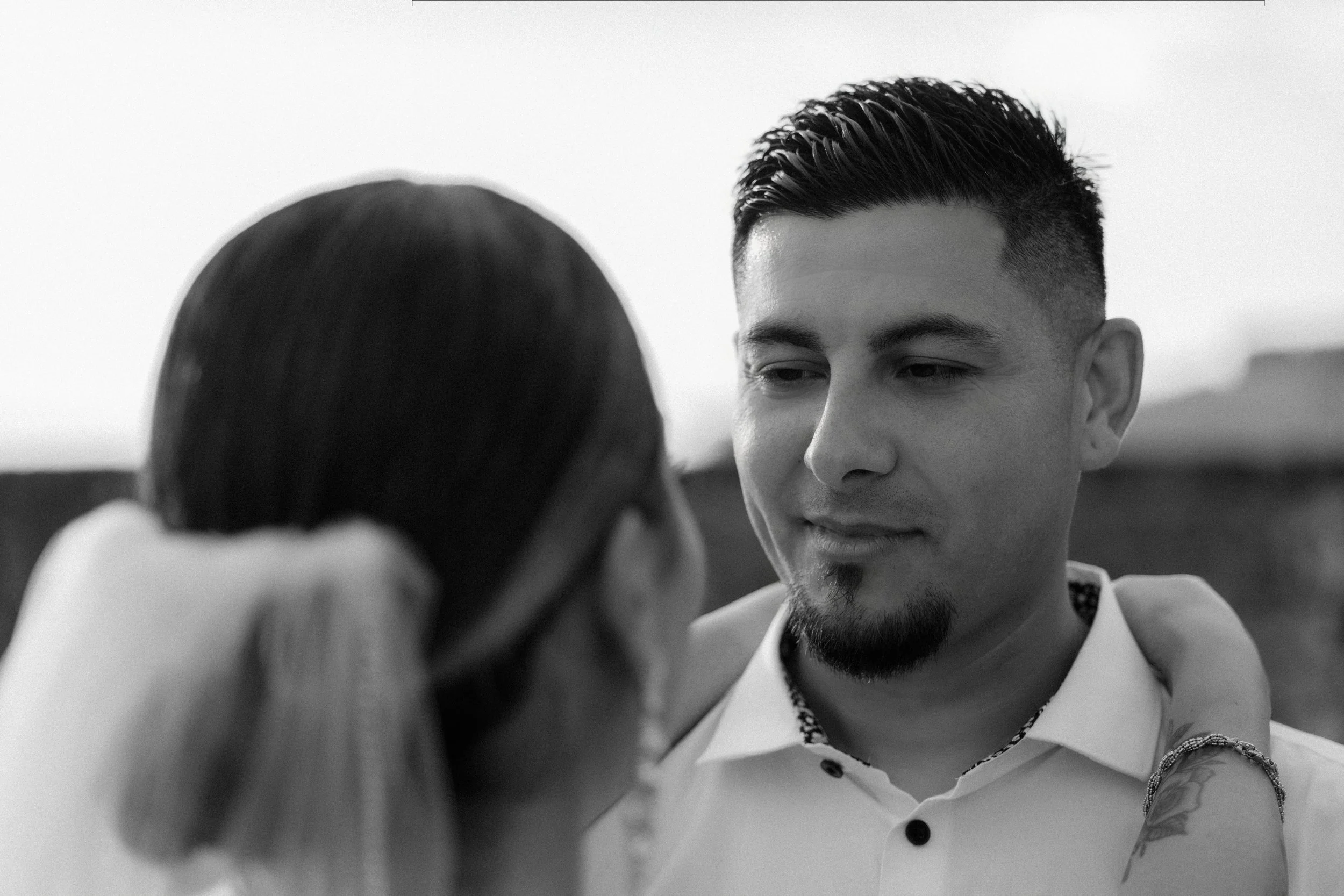 Groom gazing into bride's eyes during an intimate moment of their destination elopement wedding in Old San Juan, Puerto Rico