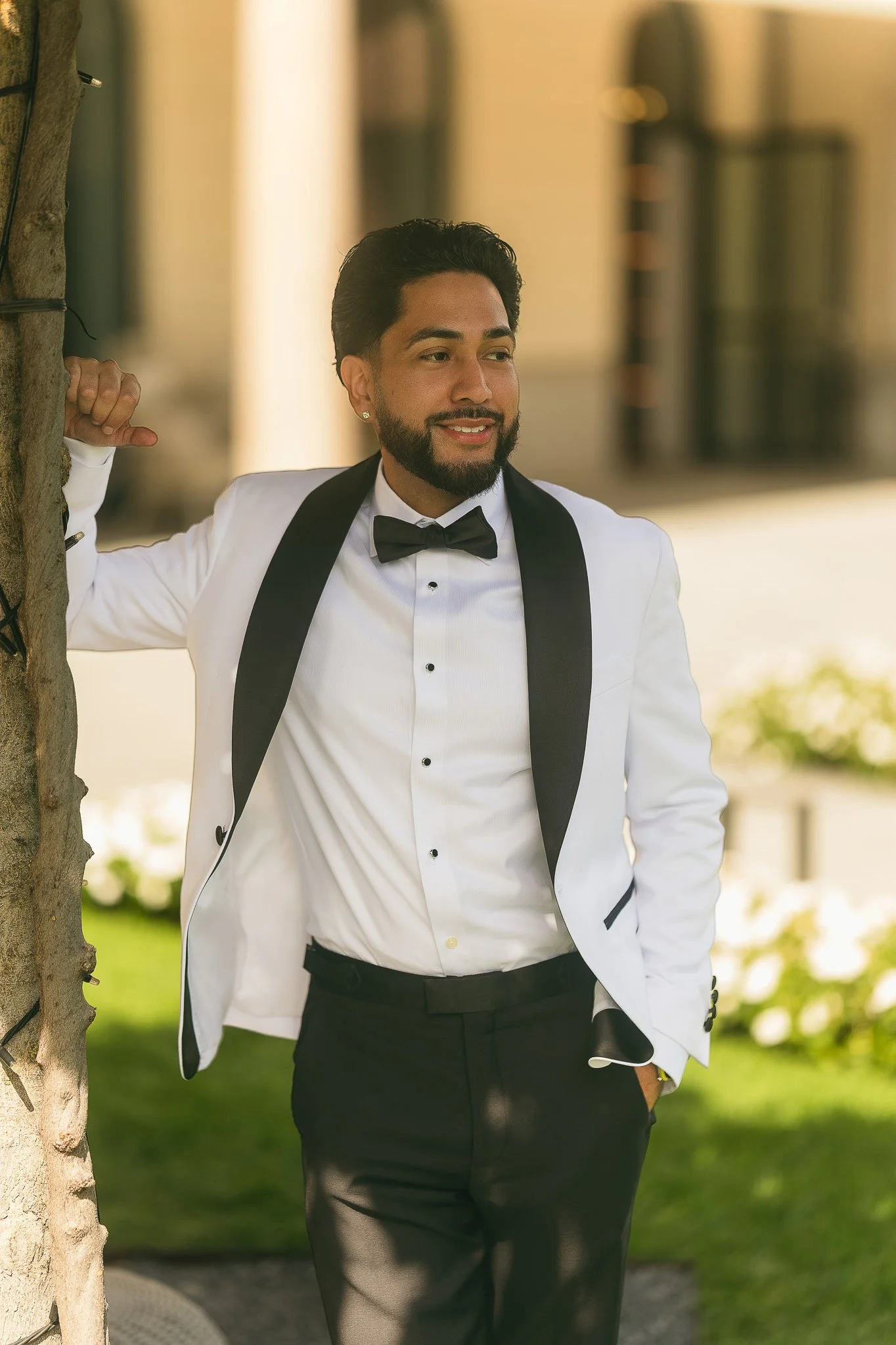 Editorial portrait of a groom at Grand Hotel Victoria in Menaggio, Lake Como, Italy prior to his luxury elopement at Villa del Balbianello taken by a destination wedding photographer