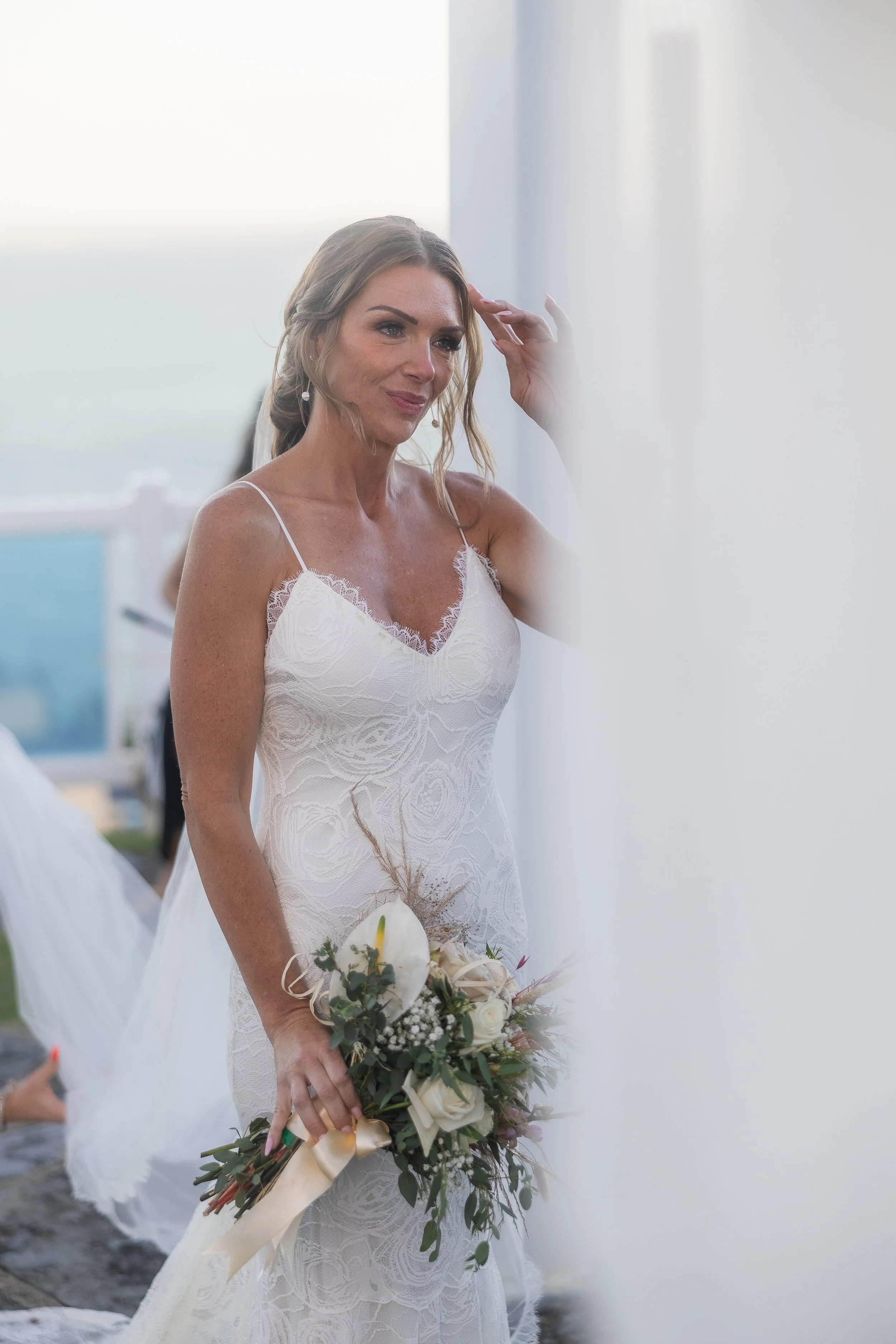 Bride in tears at El Conquistador resort during her wedding shot by an editorial photographer in Puerto Rico