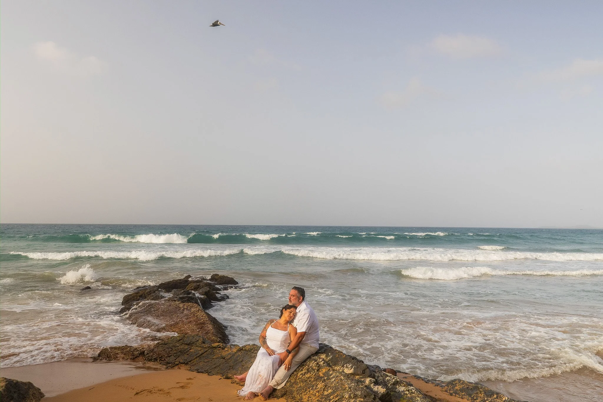 Couple embracing at the O:LV Fifty Five Hotel in Condado during their elopement in Puerto Rico