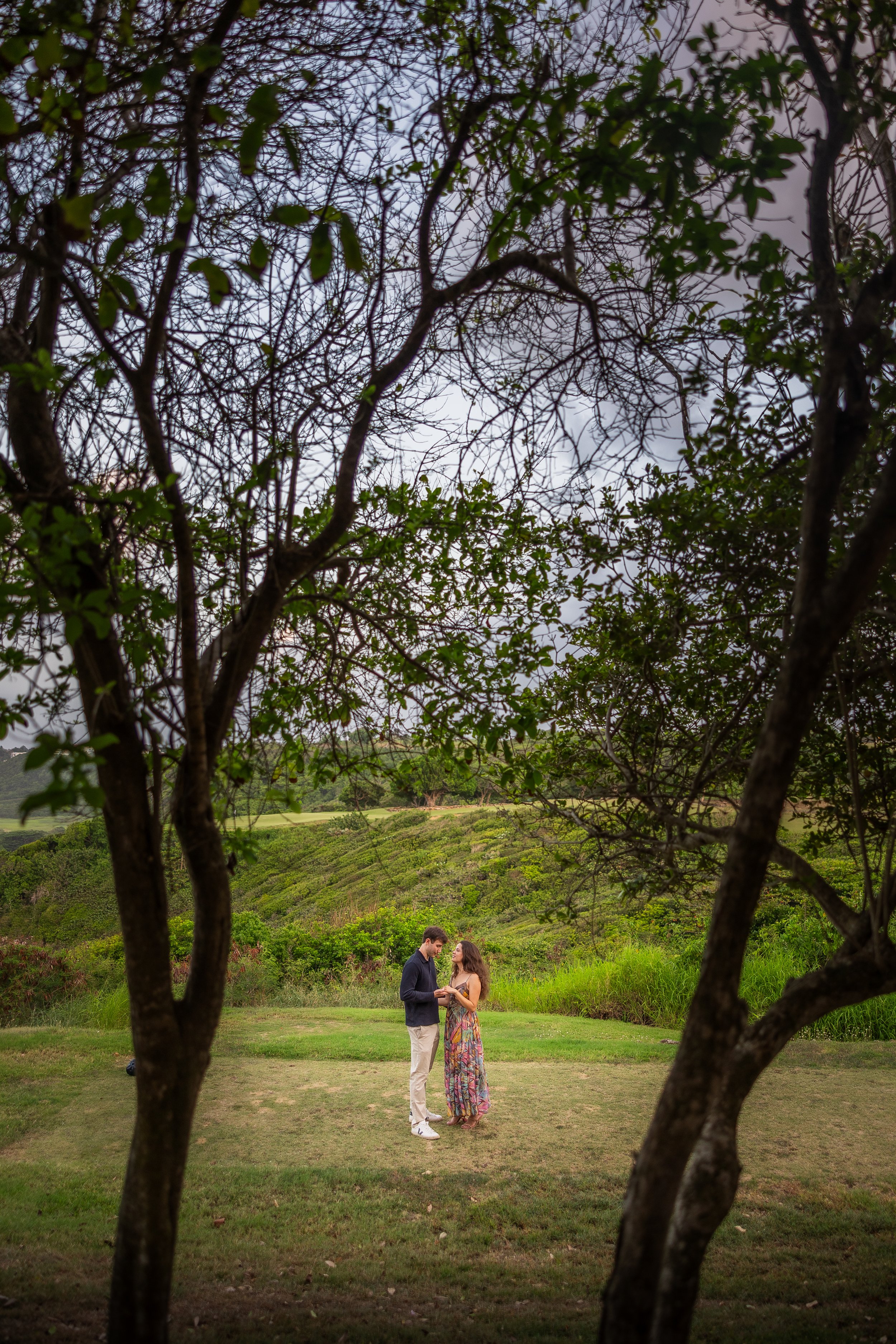 Portrait of a couple during an engagement session in Puerto Rico at Royal Isabela taken by a destination wedding photographer