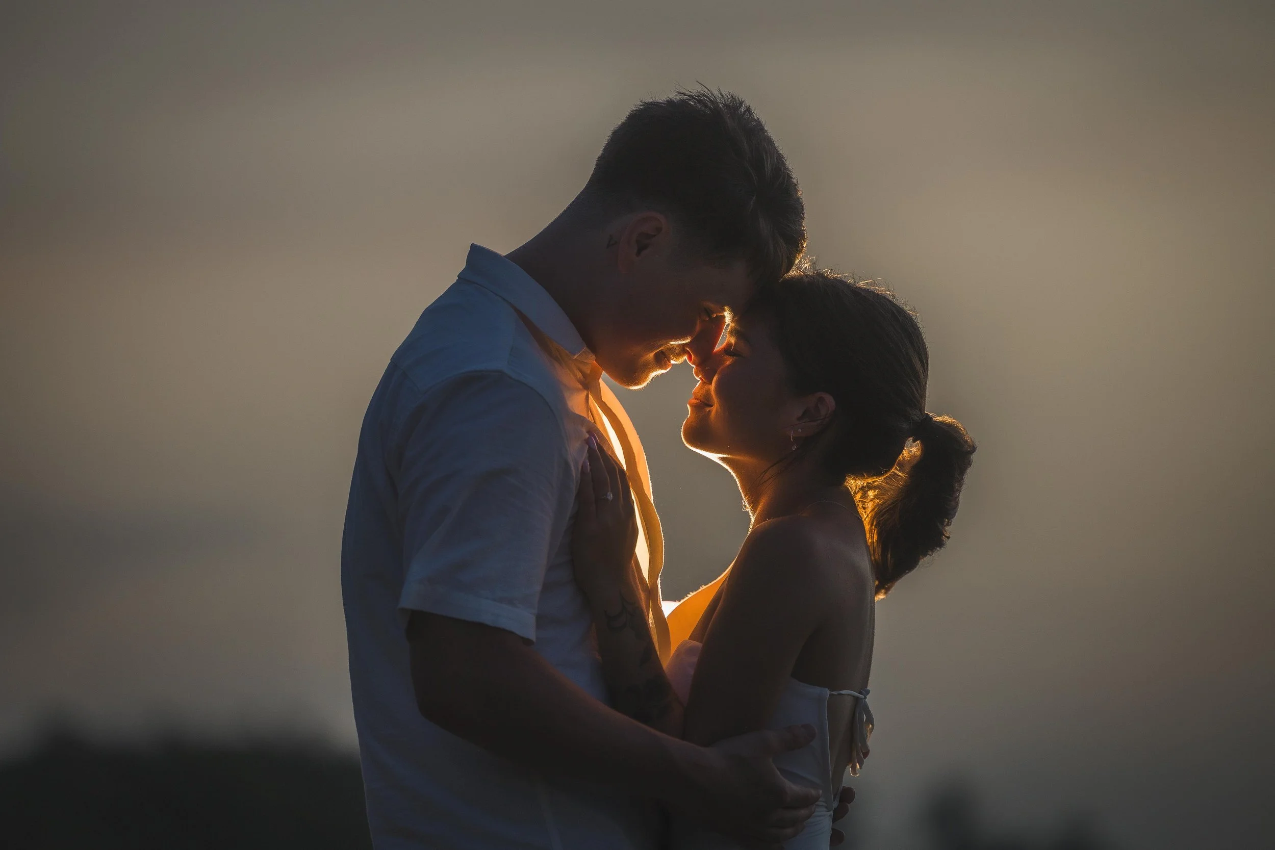 Creative flash photography at Punta Borinquen Beach in Puerto Rico during a surprise marriage proposal