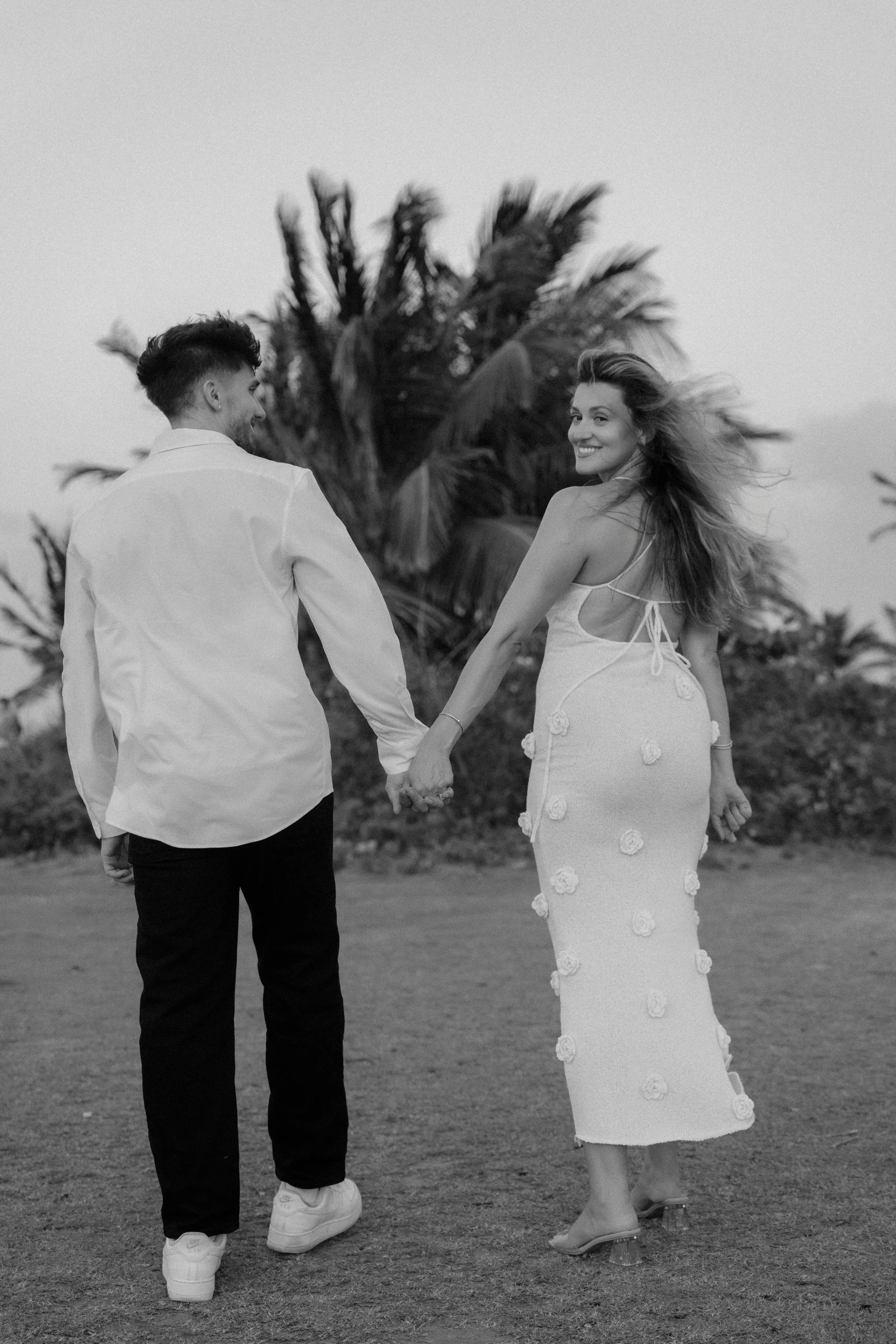Editorial portrait of a couple at Escambrón Beach during their engagement session in Puerto Rico