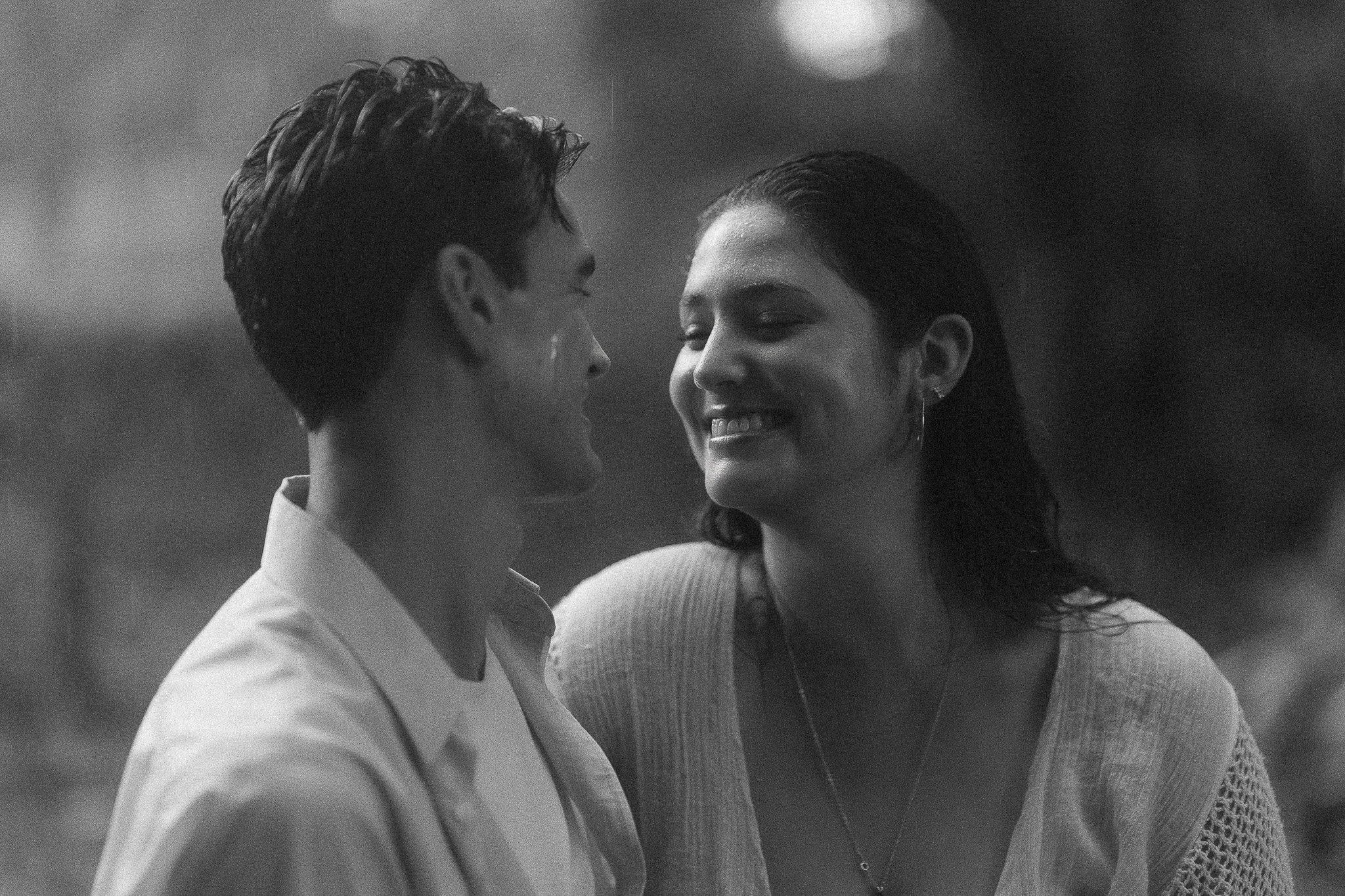 Editorial black and white portrait of an engaged couple during a surprise marriage proposal in Puerto Rico