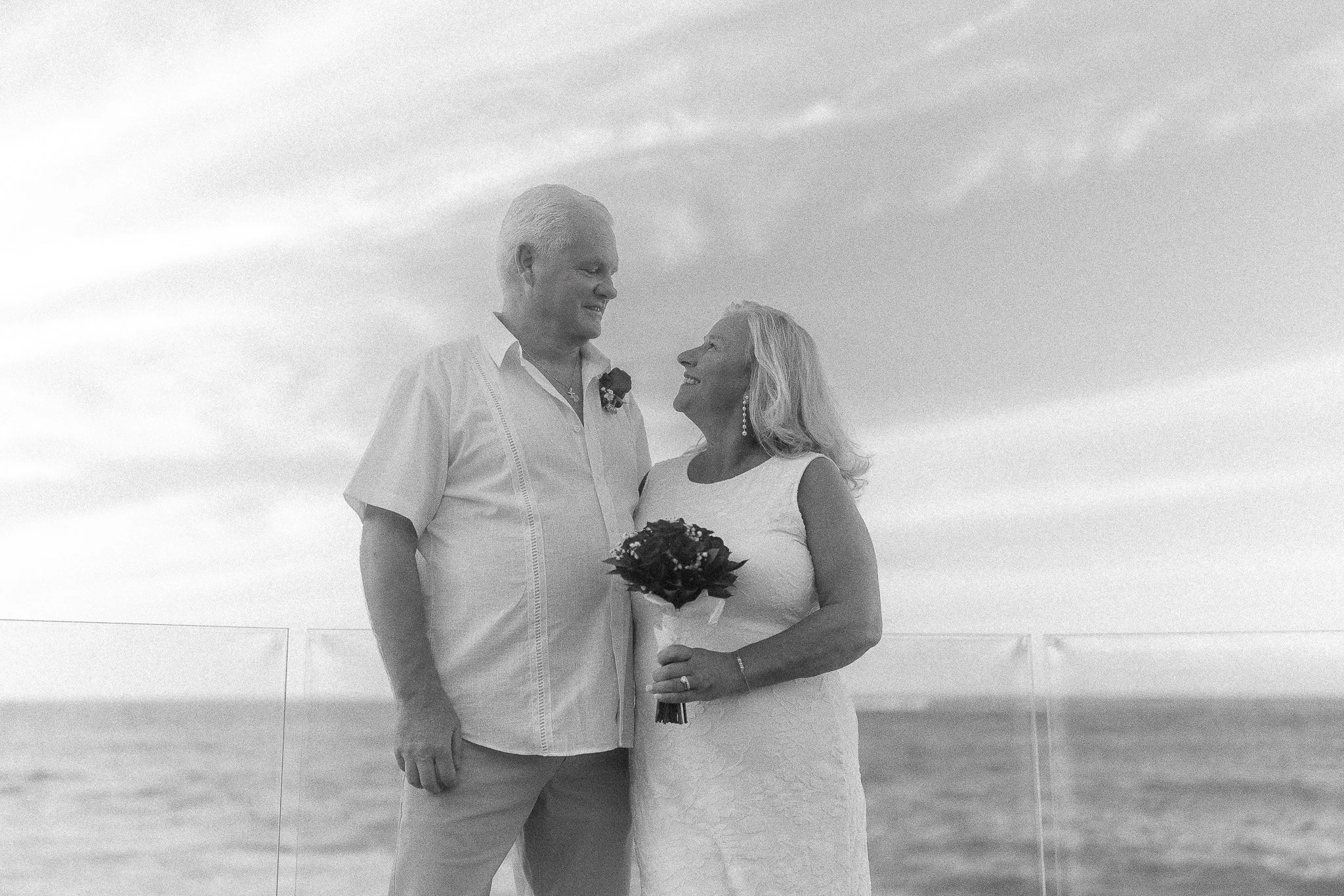 Bride and groom during their elopement ceremony at the Condado Vanderbilt Hotel taken by a Puerto Rico destination wedding photographer