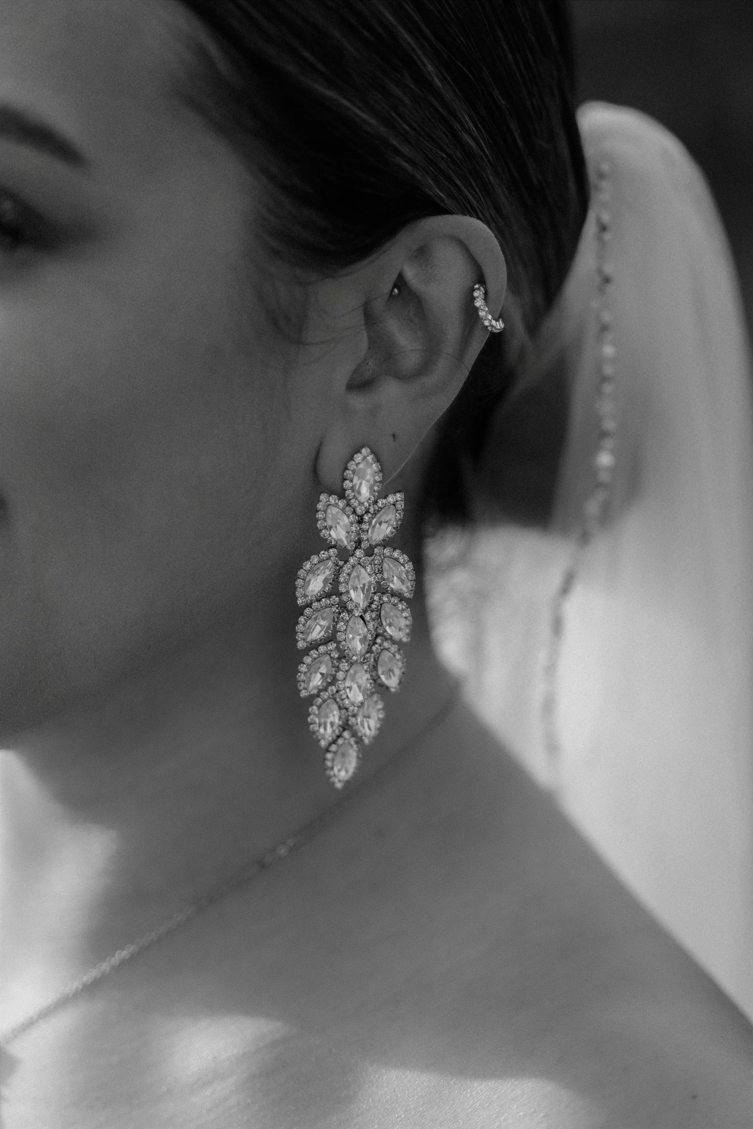 A bride's earrings shot by a luxury wedding photographer during an intimate elopement in Old San Juan, Puerto Rico