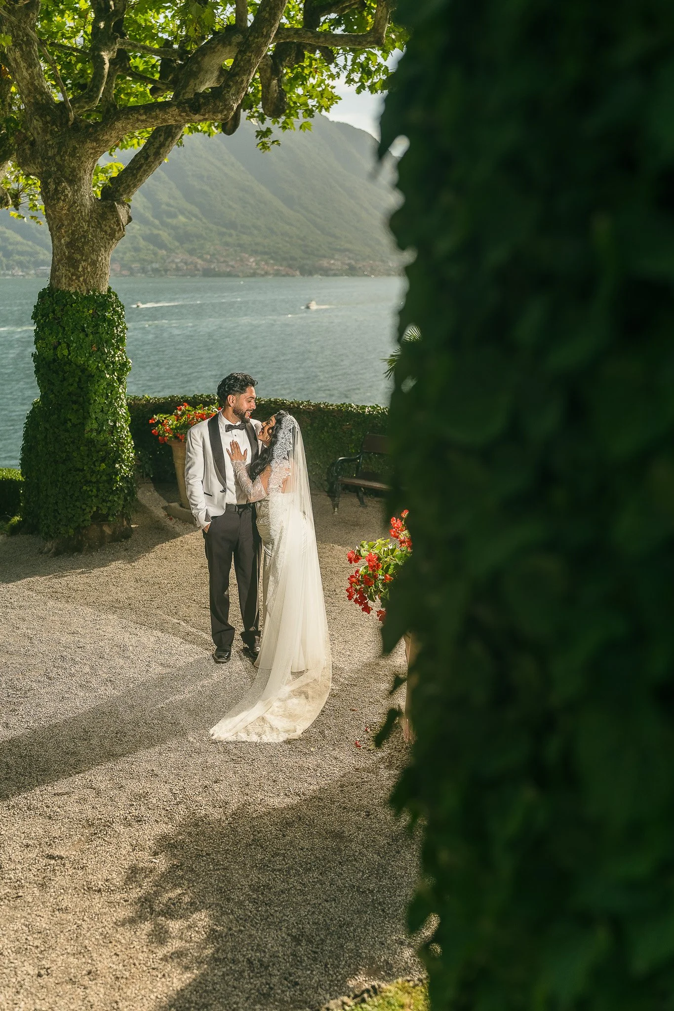 Bride and groom posing during their editorial elopement at the Villa del Balbianello shot by a wedding photographer in Lake Como, Italy