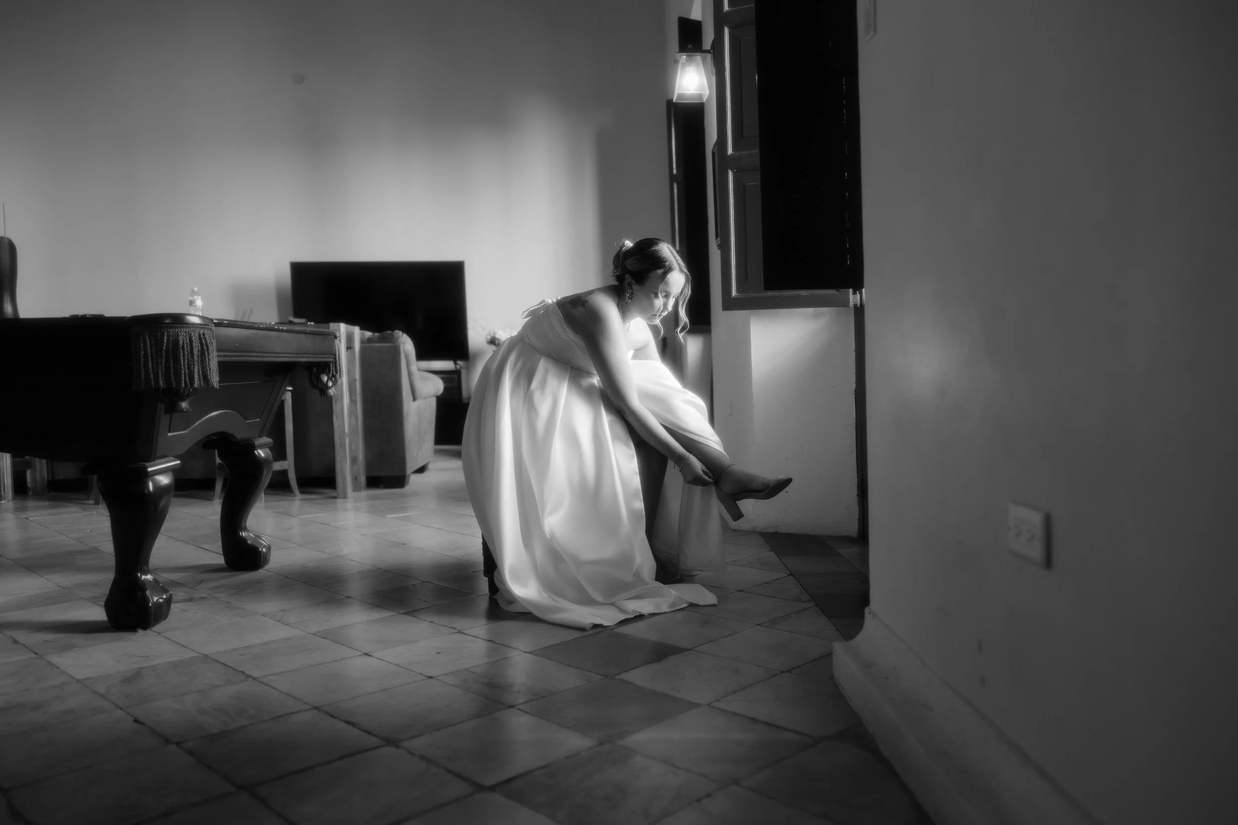 Bride getting ready in a refined bridal suite during a destination wedding