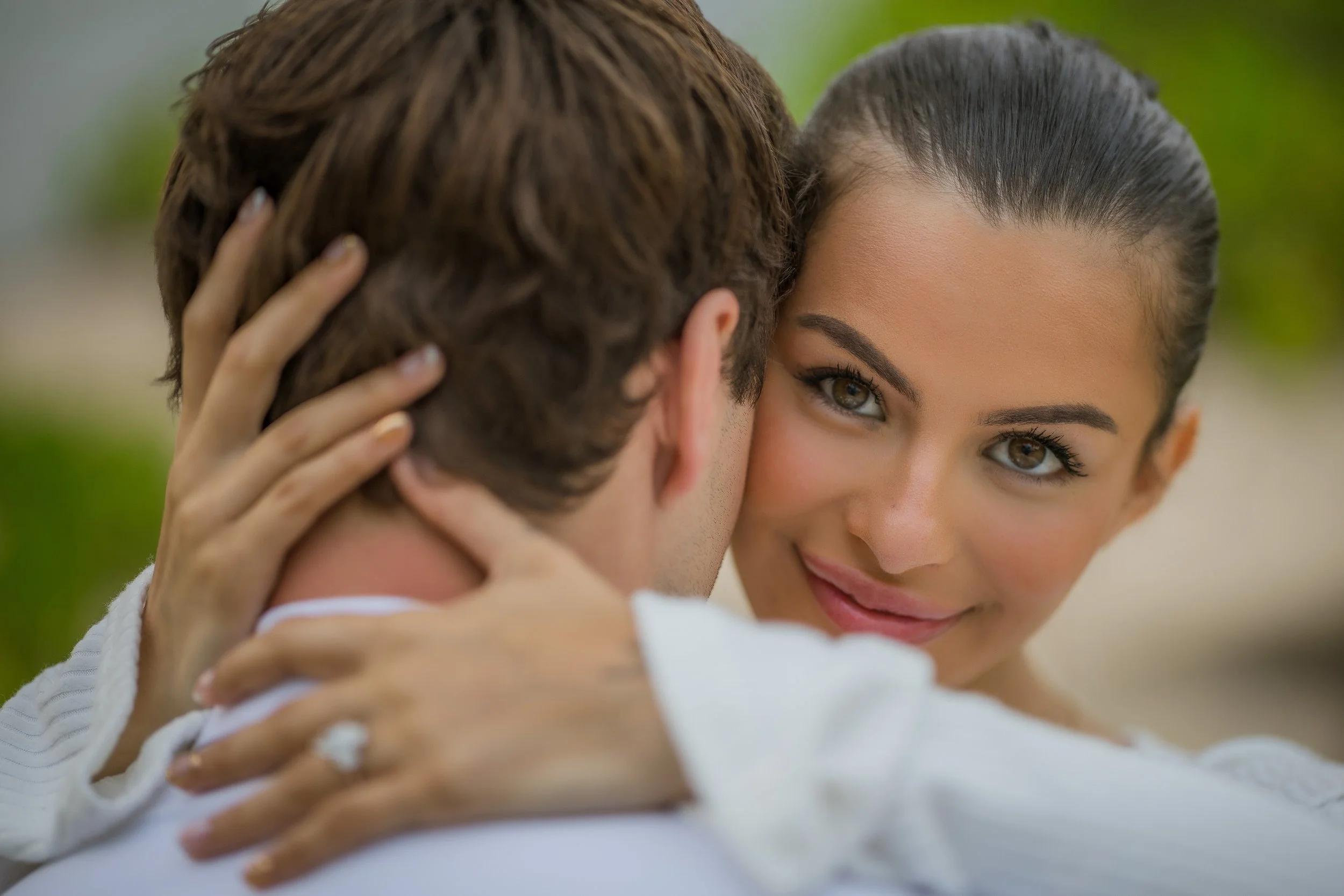 Woman smiling at camera during a marriage proposal in Puerto Rico at the Hyatt Regency Grand Reserve