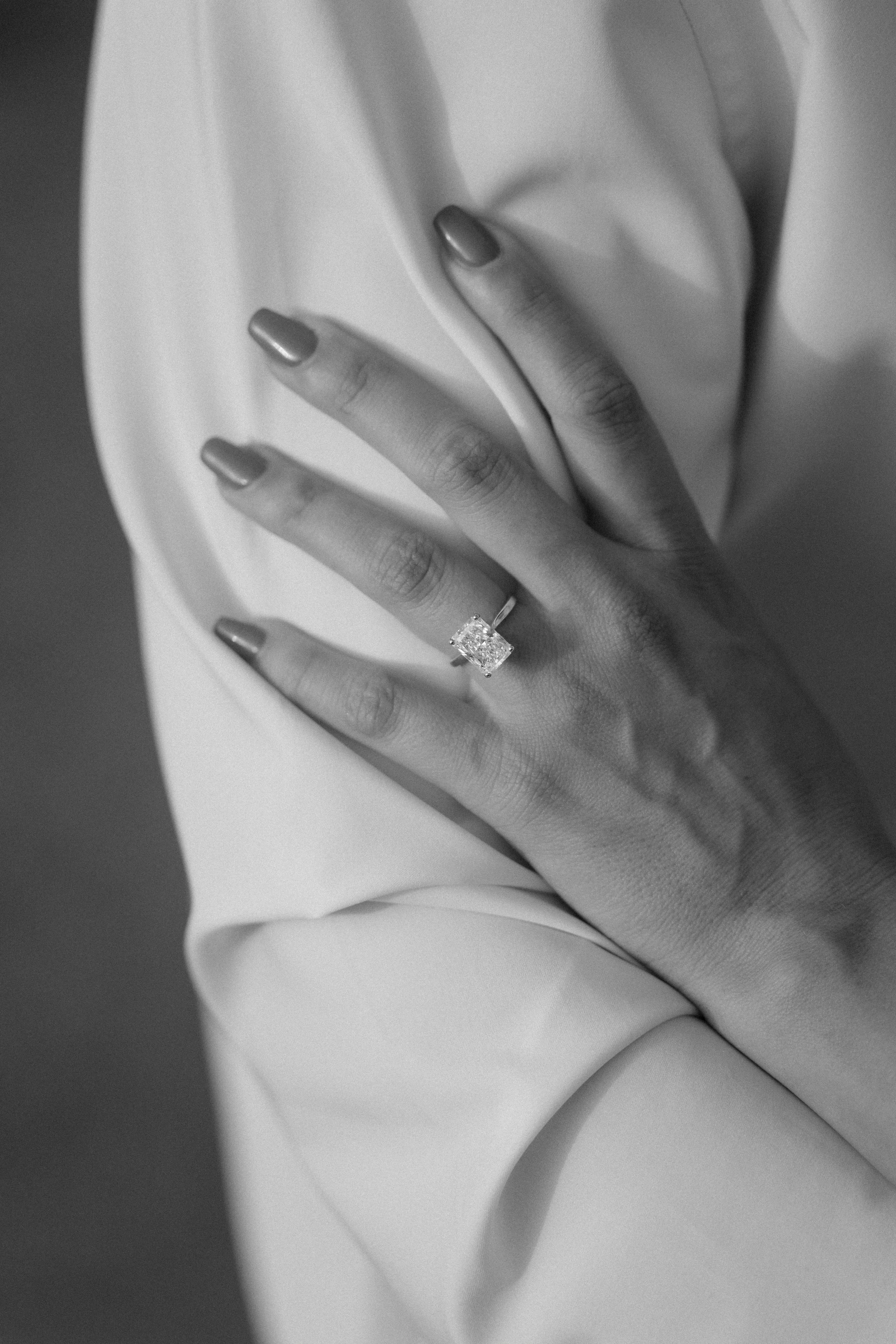 Luxury diamond engagement ring taken by a wedding photographer in Puerto Rico during a surprise marriage proposal at Escambrón Beach