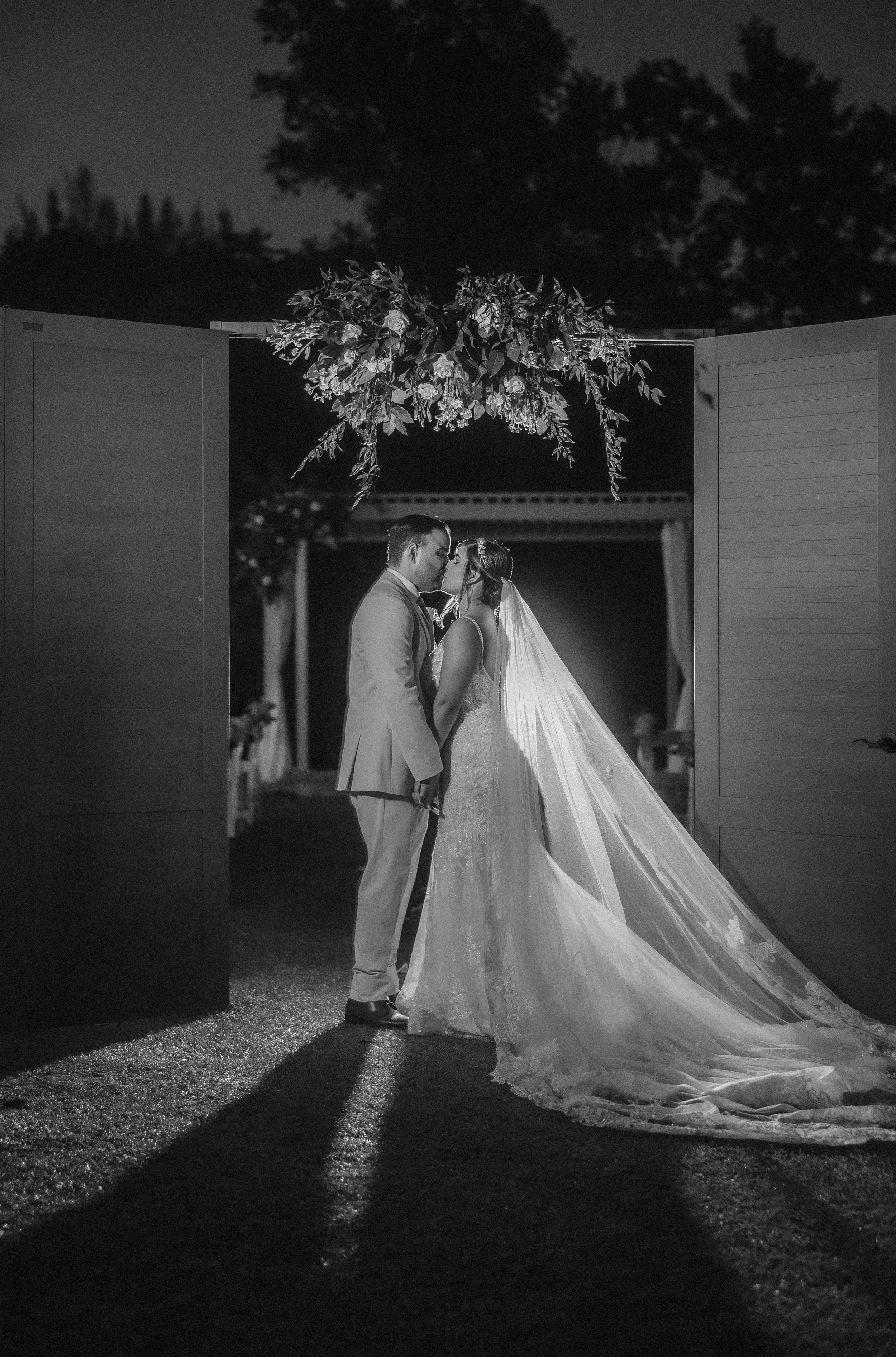 Couple kissing at wedding in Hacienda Santiago in Puerto Rico