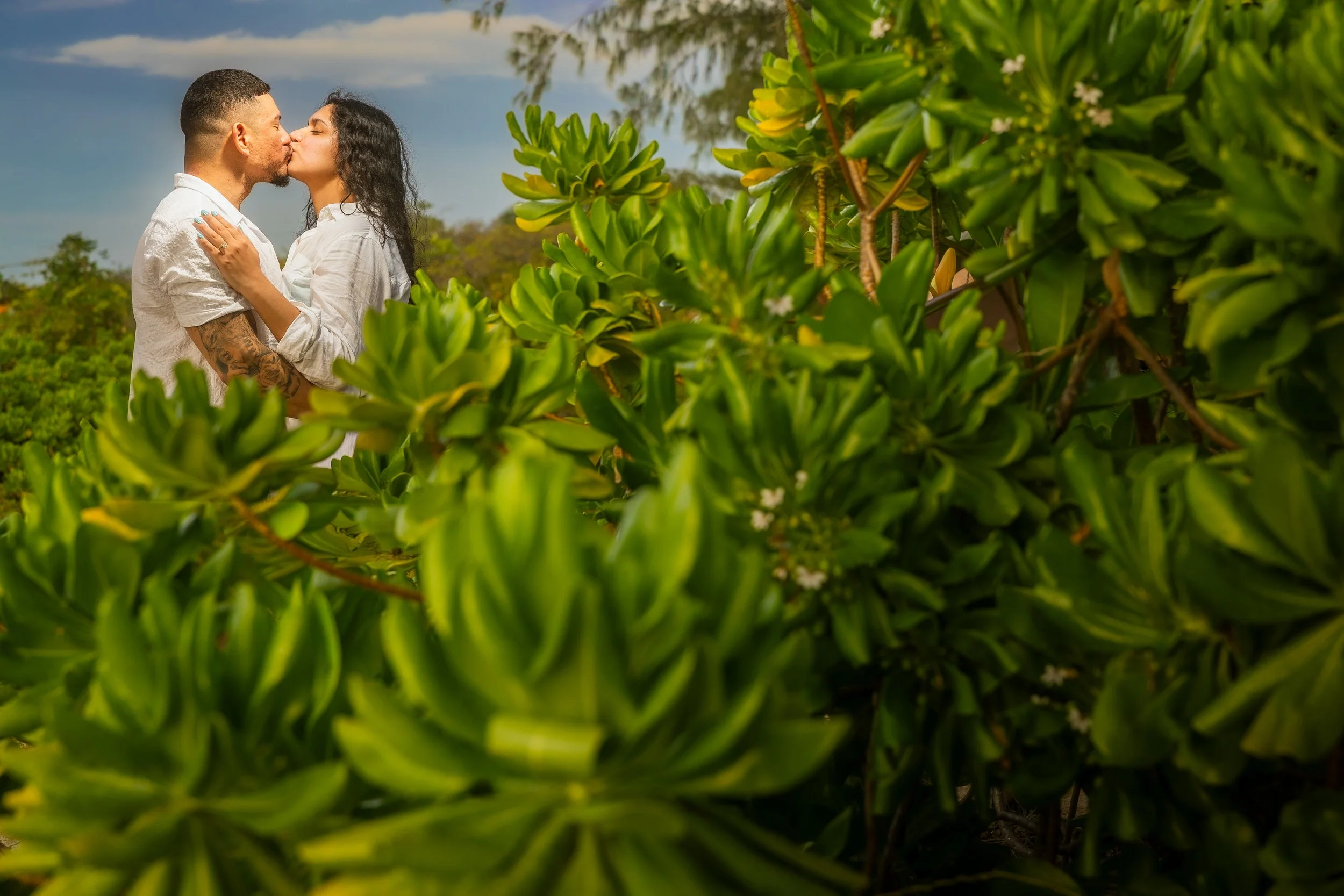 Couple kissing on Icacos Island after a surprise marriage proposal in Puerto Rico