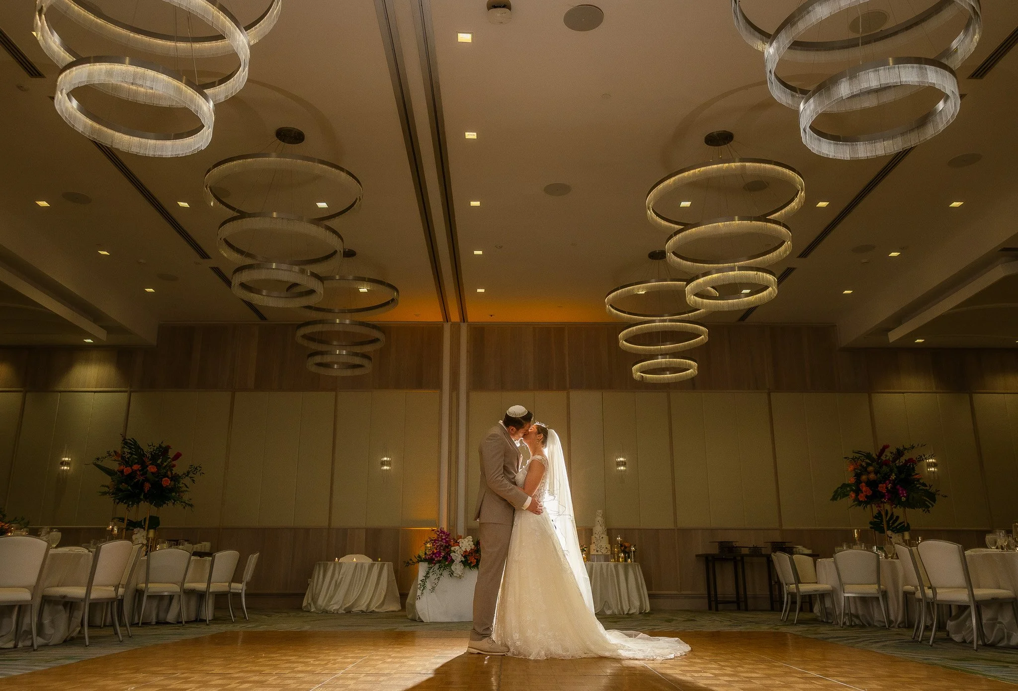 Jewish bride and groom kissing shot by a luxury wedding photographer in Puerto Rico at La Concha Resort