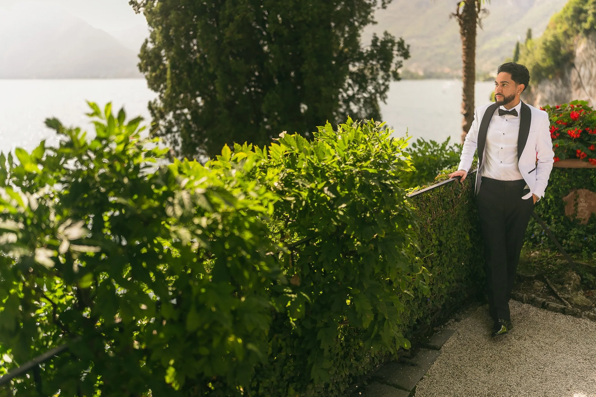 Editorial portrait of a groom at Villa del Balbianello taken by a destination wedding photographer during his luxury elopement in Lake Como
