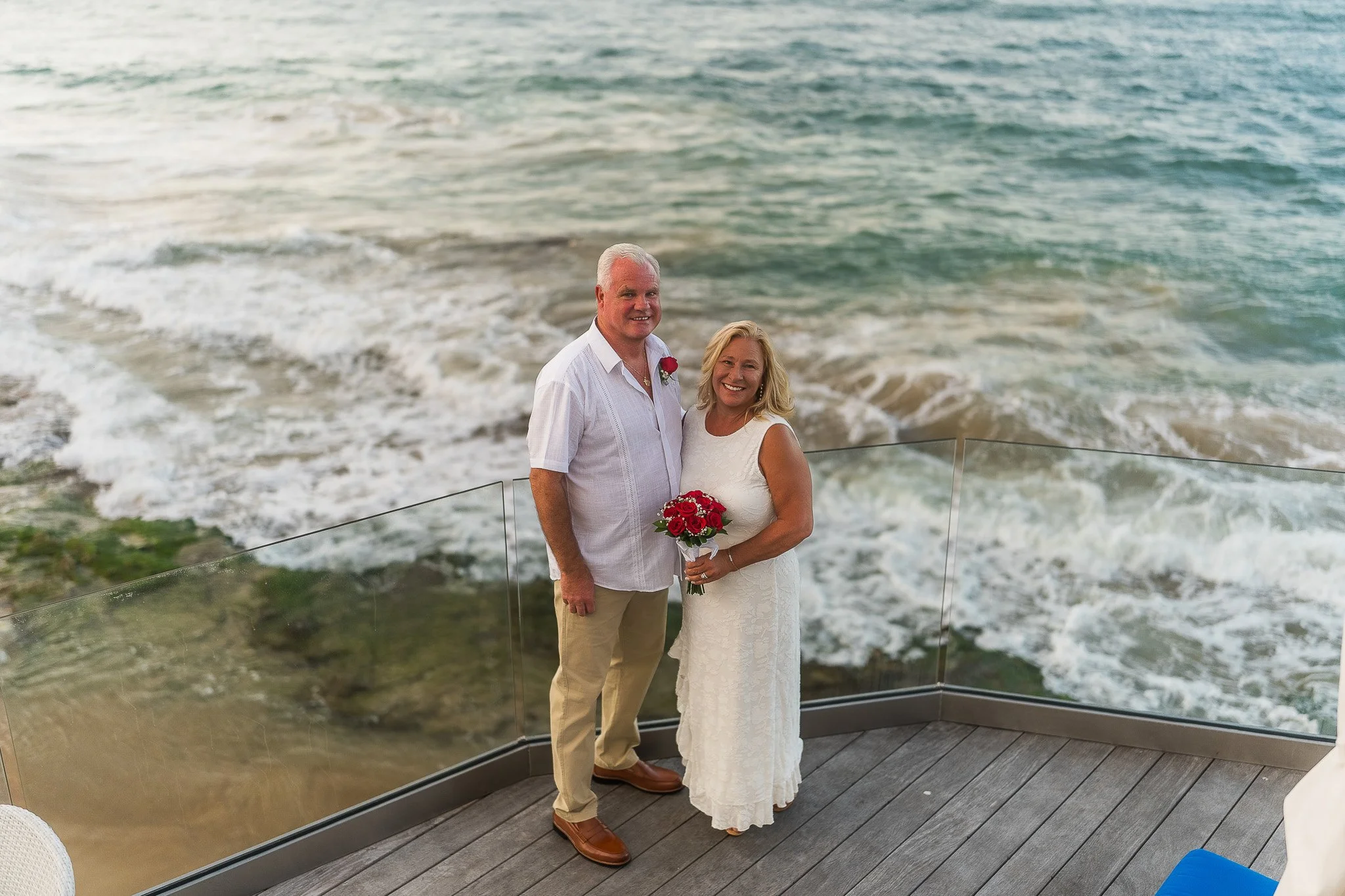 Bride and groom at the observation deck of the Condado Vanderbilt Hotel during their elopement wedding in Puerto Rico