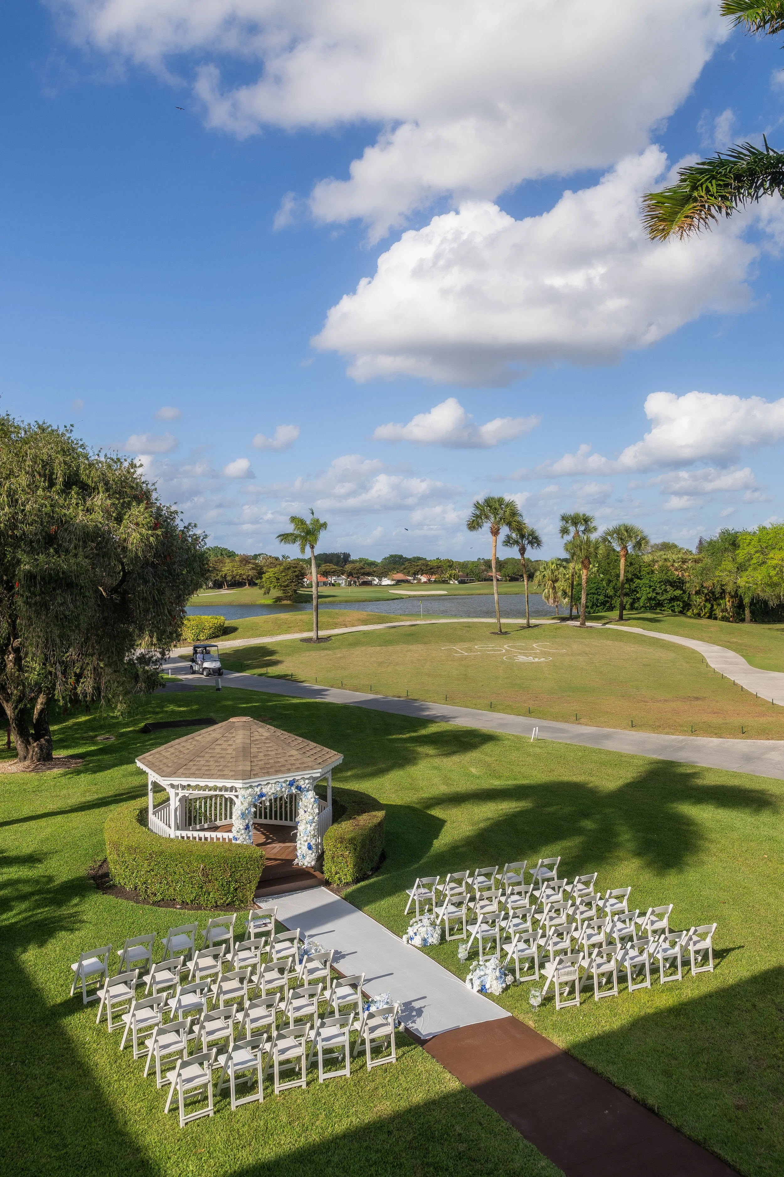 Panoramic shot of the ceremony venue at Indian Spring Country Club taken by a luxury South Florida wedding photographer.