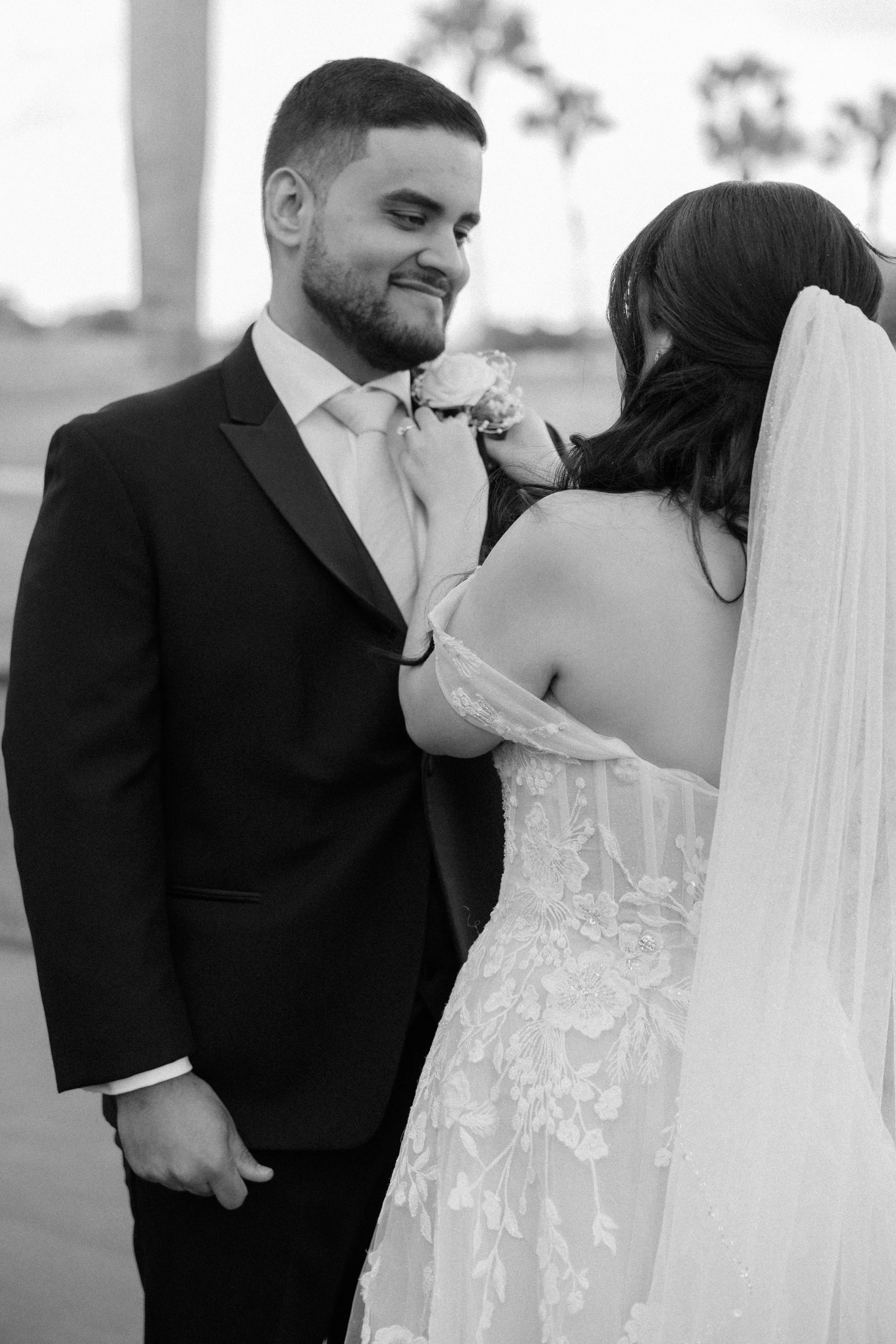 Bride and groom during their first look at Indian Spring Country Club taken by a luxury wedding photographer in South Florida