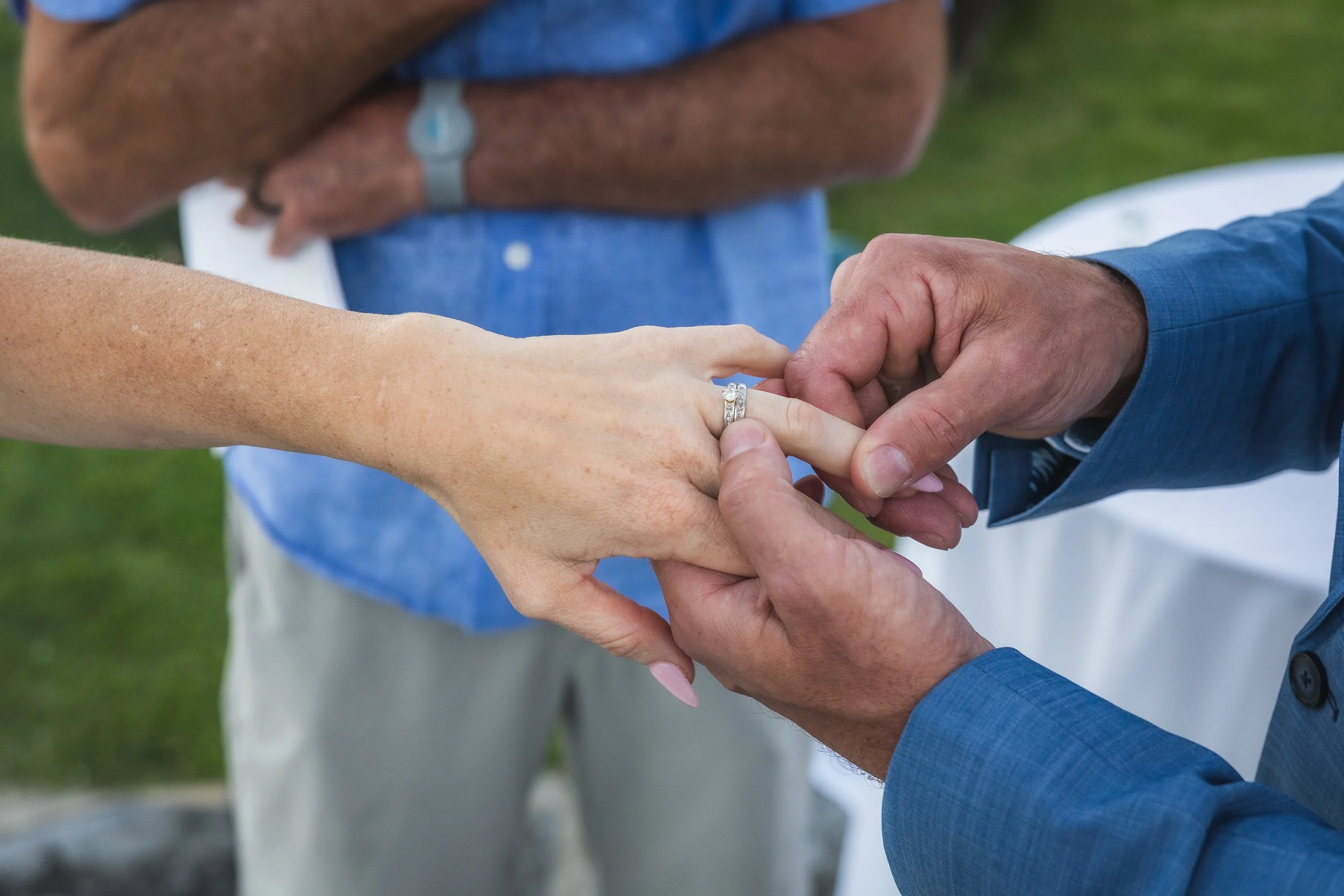 Ring exchange at El Conquistador Resort shot by a luxury wedding photographer in Puerto Rico