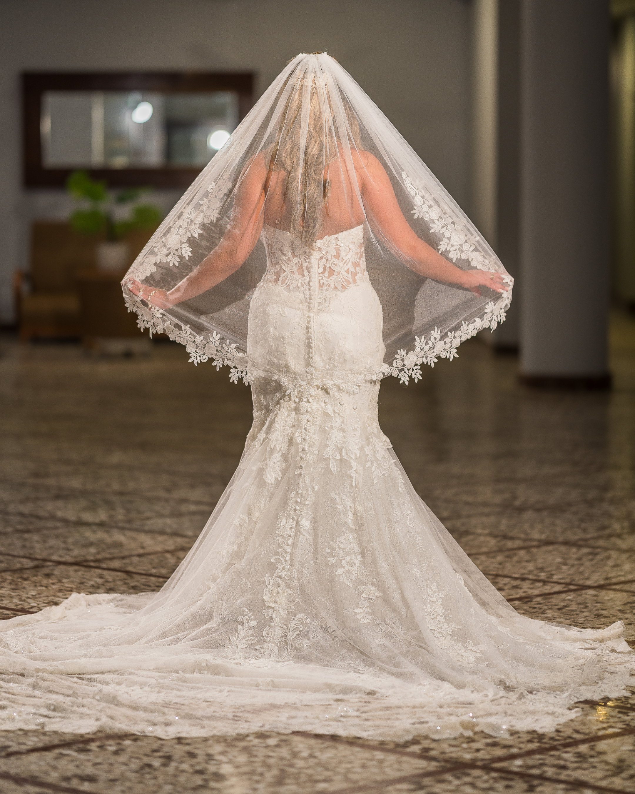 Bride imitating Kim Kardashian during her elopement wedding in Puerto Rico
