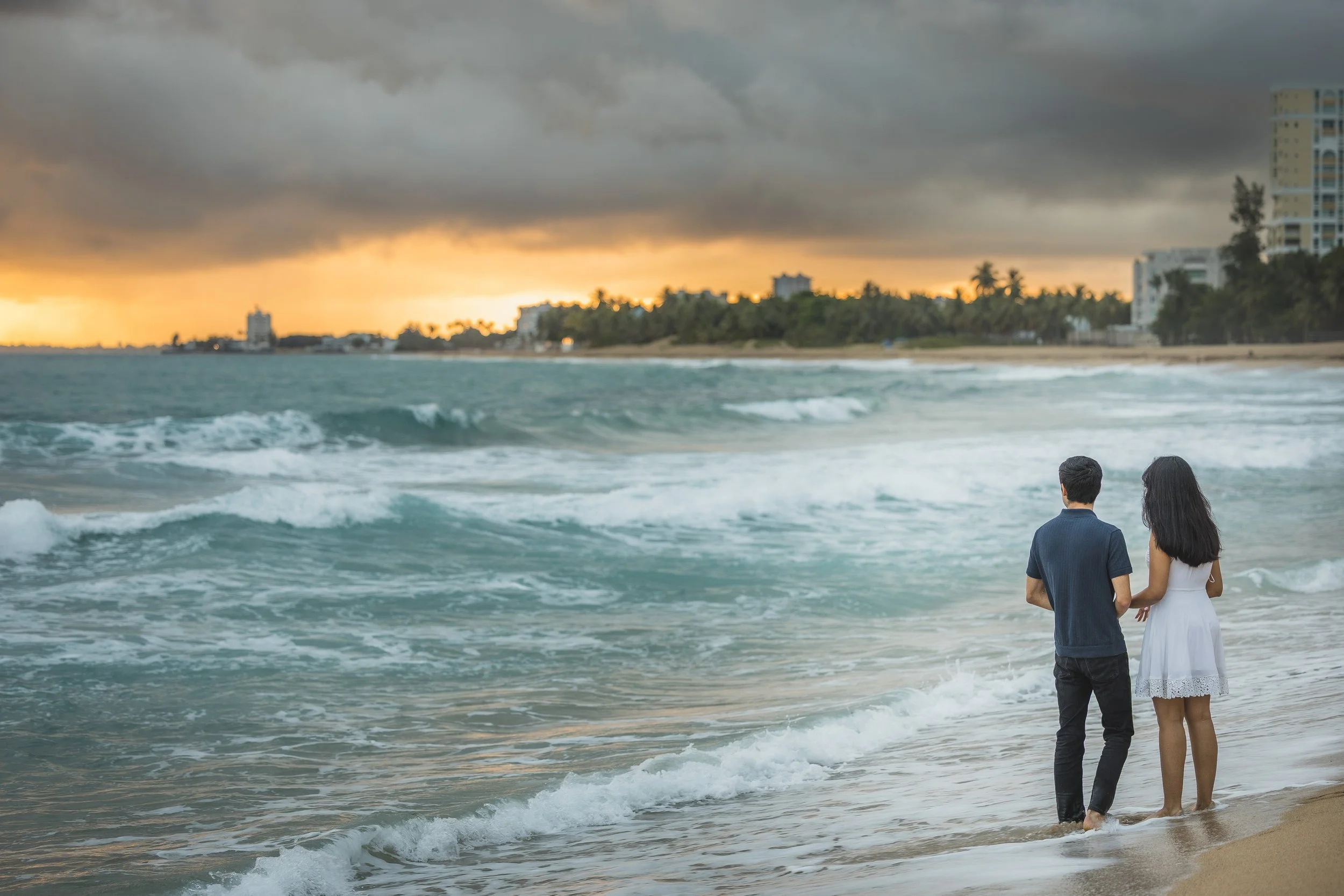 Beach marriage proposal in Puerto Rico at Isla Verde taken by an elopement photographer