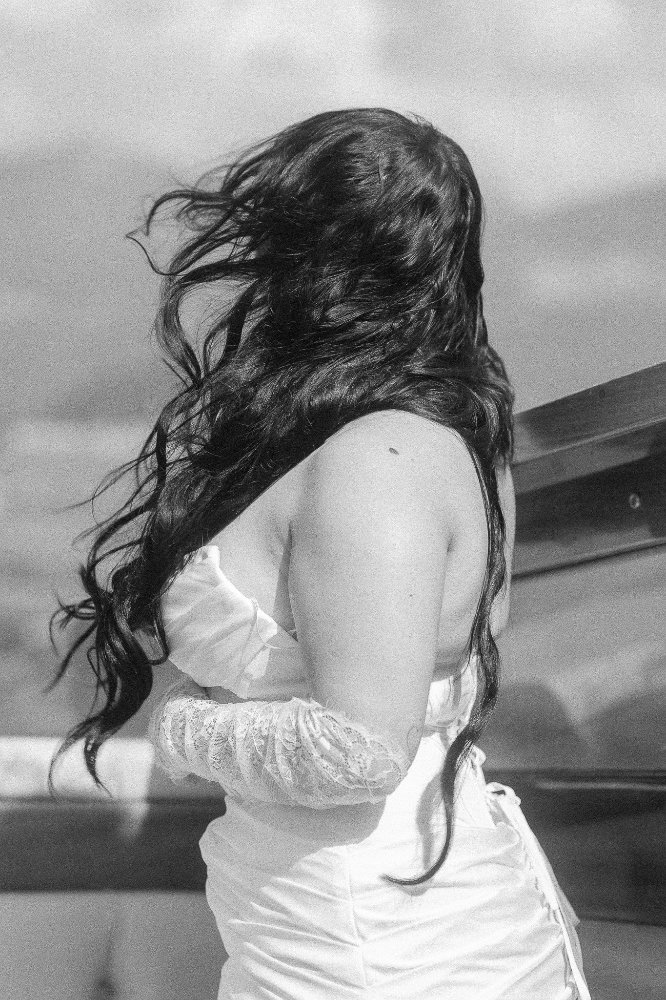 Black and white portrait of a bride during her luxury elopement at Villa del Balbianello in Lake Como taken by a destination wedding photographer in Italy