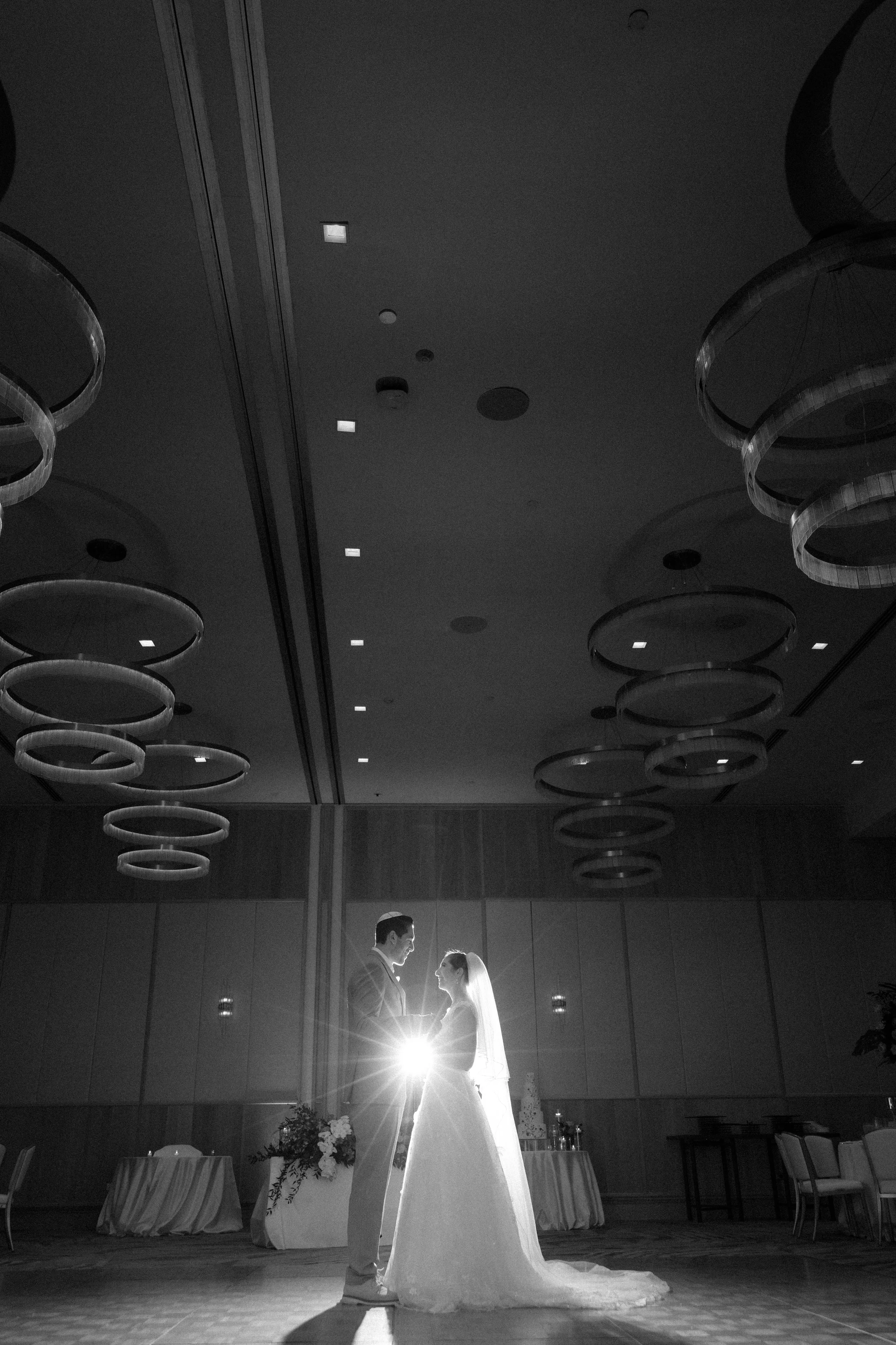 Jewish bride and groom embracing at La Concha Resort shot by a luxury wedding photographer in Puerto Rico