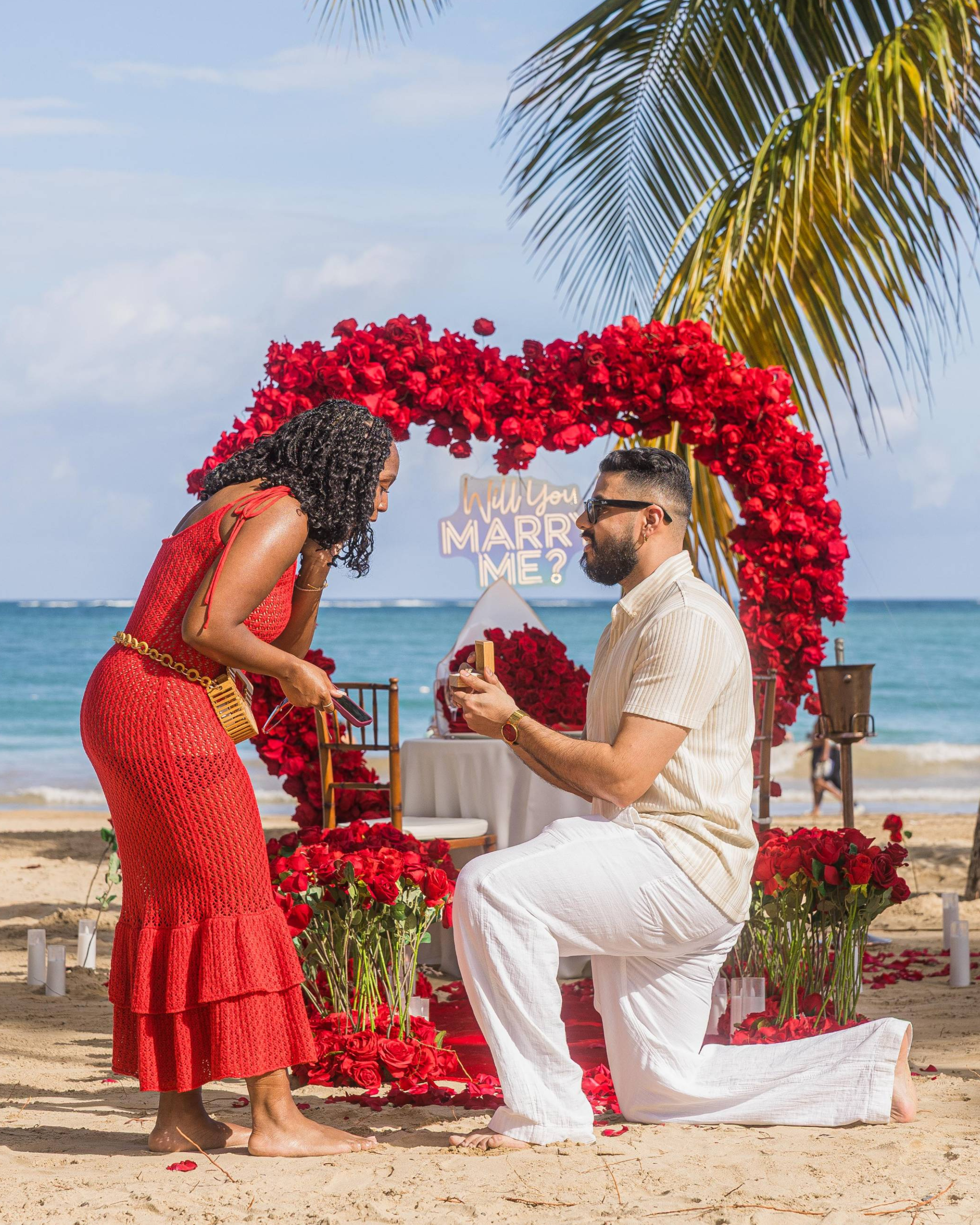 Man proposing to woman on beach in Puerto Rico