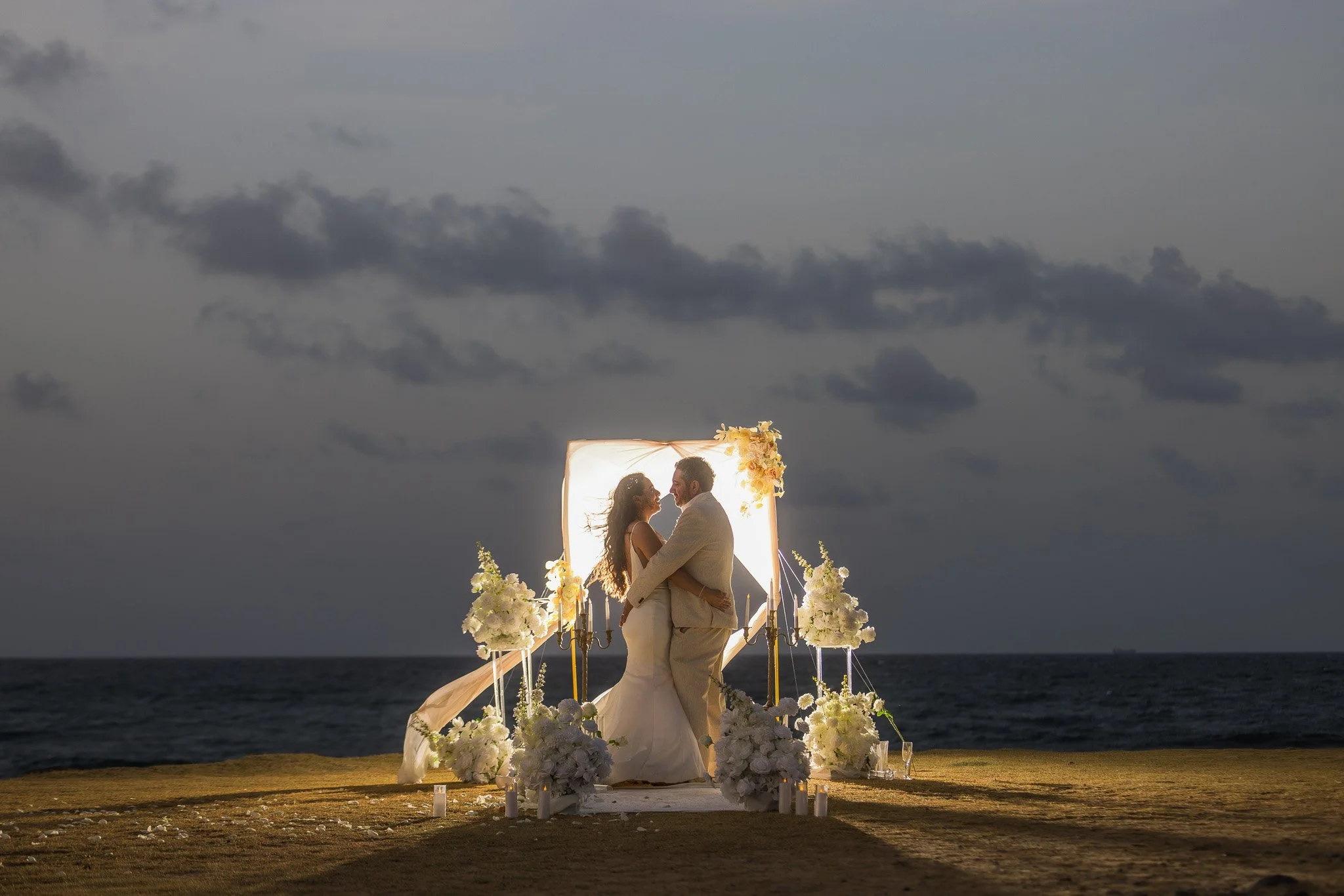 Luxury flash photographer in Puerto Rico during an elopement at Escambrón Beach