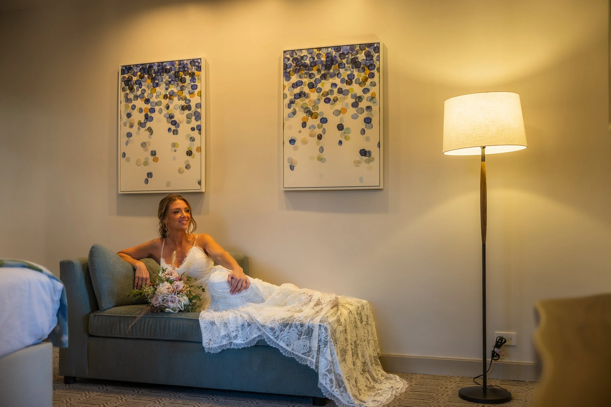 Bride lounging in her room at El Conquistador Resort taken by a luxury wedding photographer in Puerto Rico