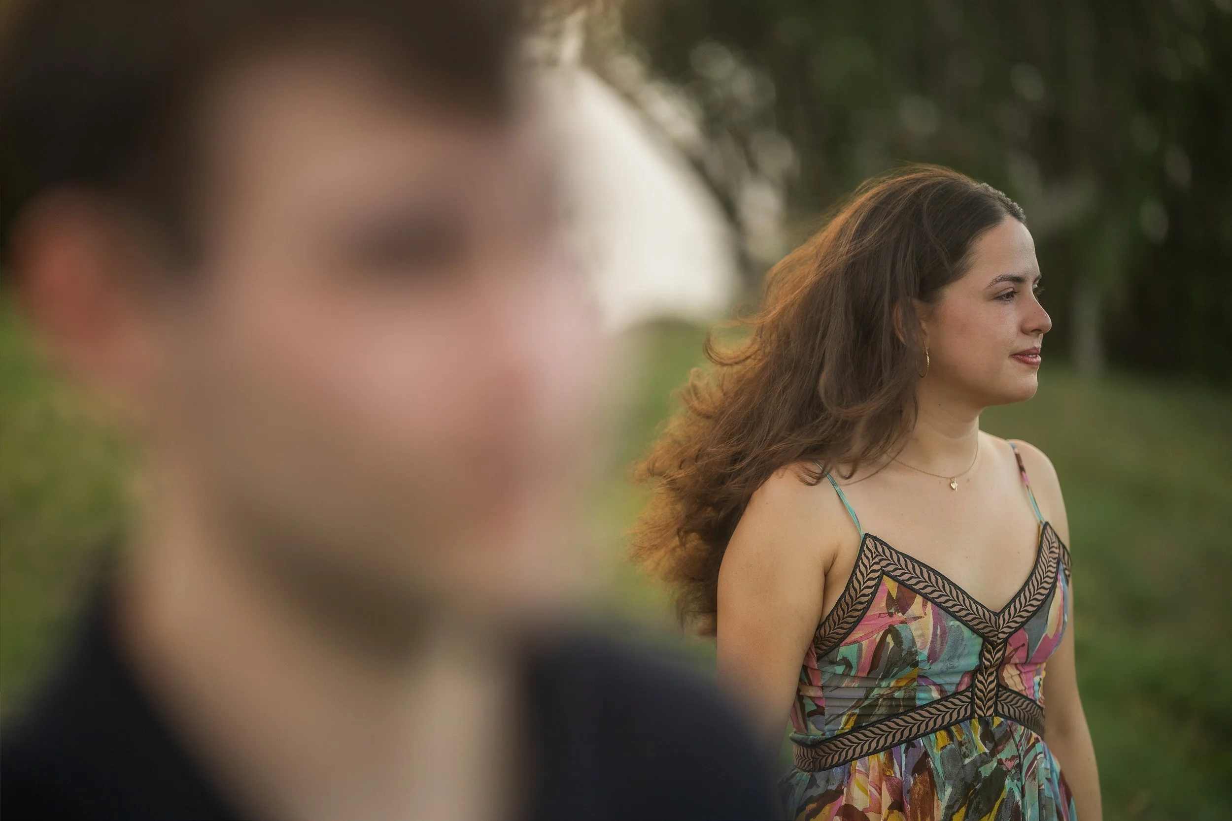 Couple embracing at Royal Isabela in Puerto Rico taken by a surprise marriage proposal photographer