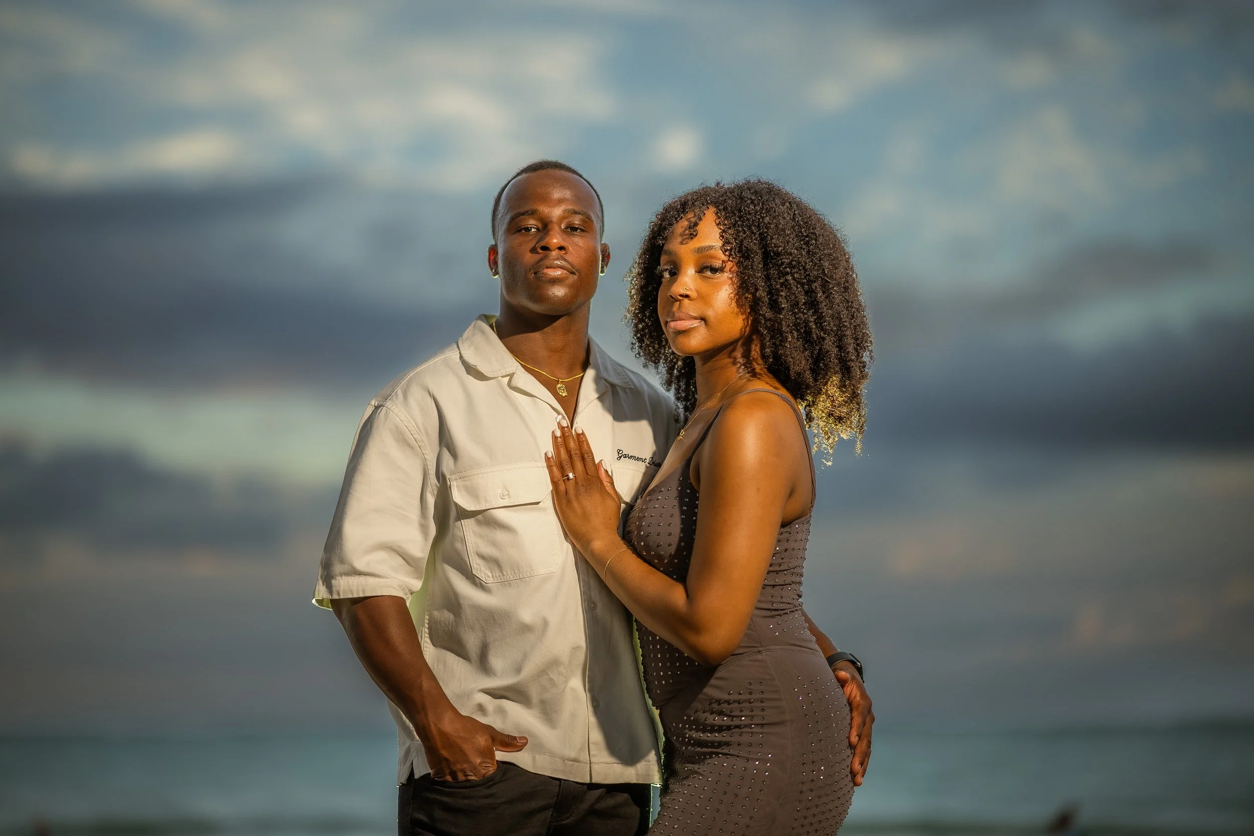 Professional proposal photographer documenting intimate engagement moment for future wedding clients.