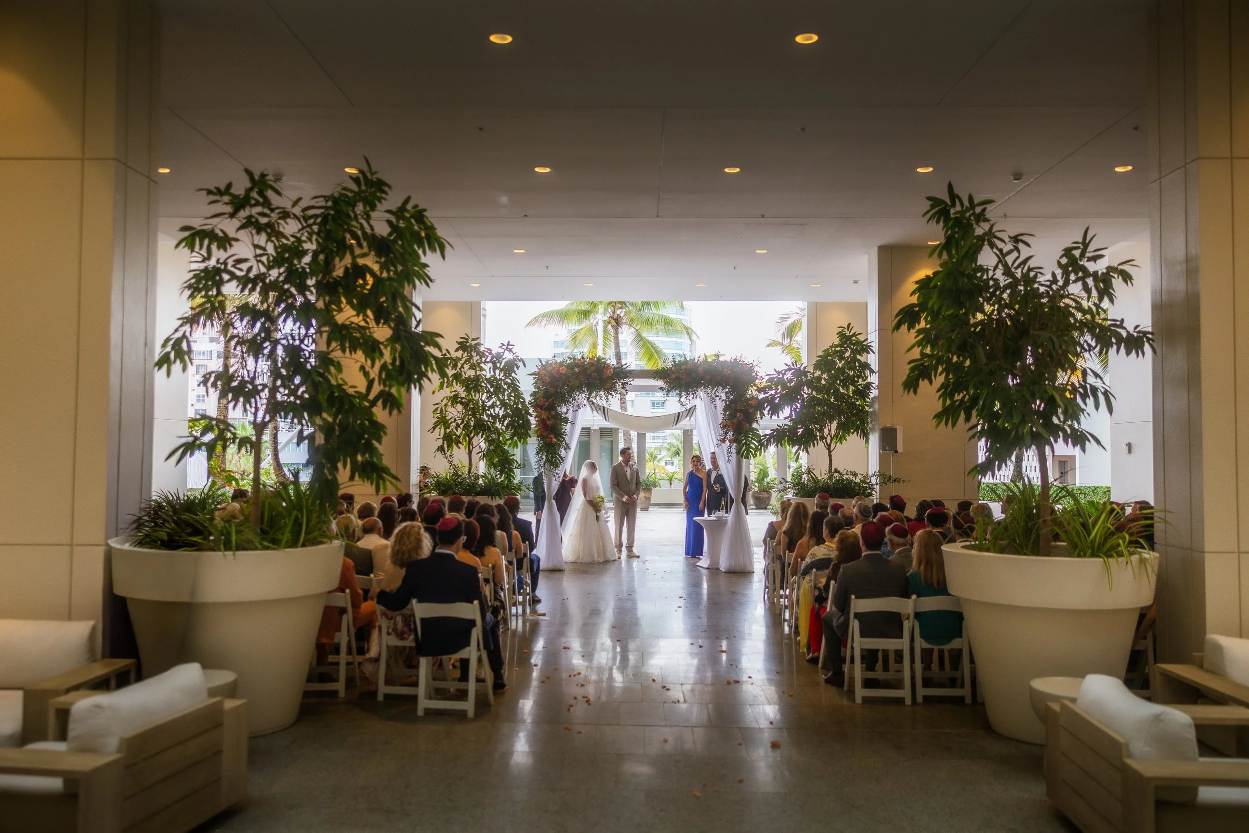 Jewish wedding ceremony shot by a luxury elopement photographer in Puerto Rico at La Concha Resort
