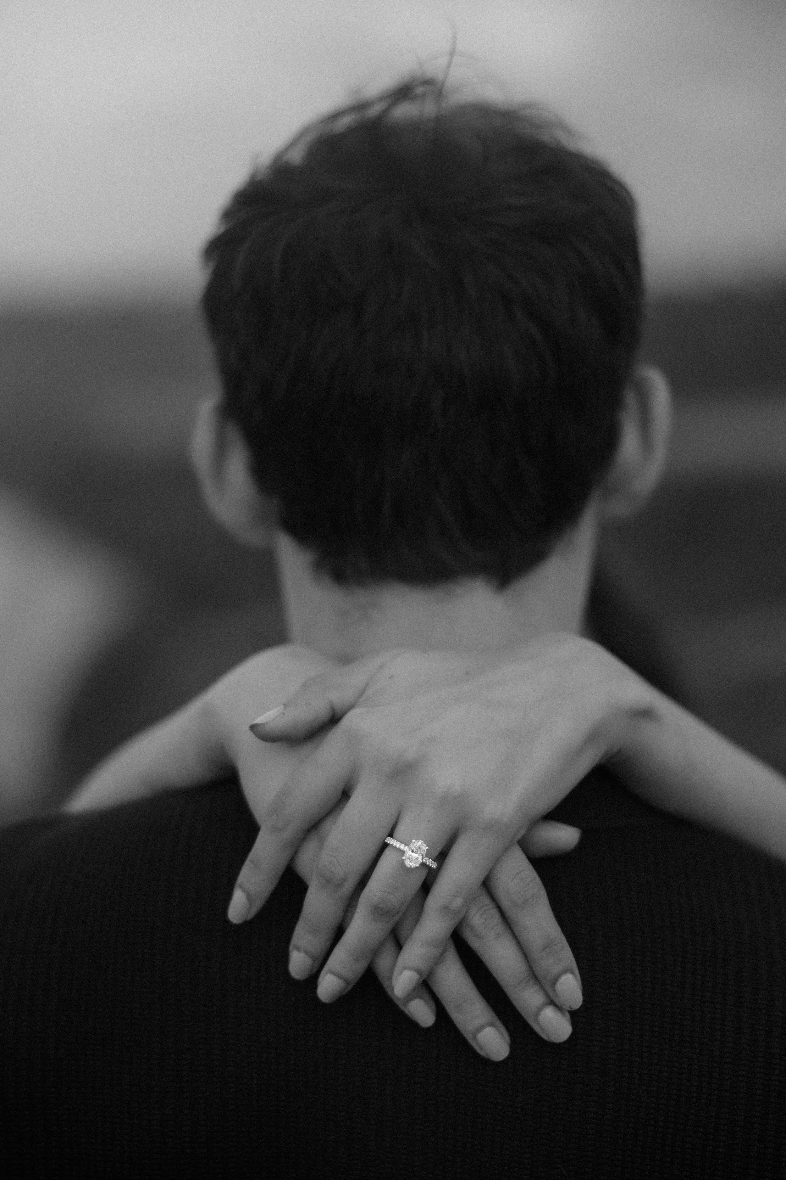 Black and white editorial portrait of a couple during an engagement session in Puerto Rico at Royal Isabela taken by a destination wedding photographer